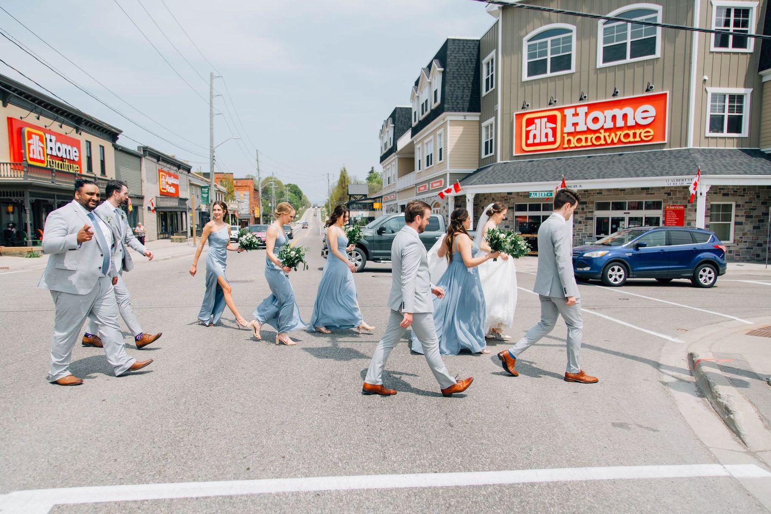 Wedding party walking along the street in St. Jacob's Ontario