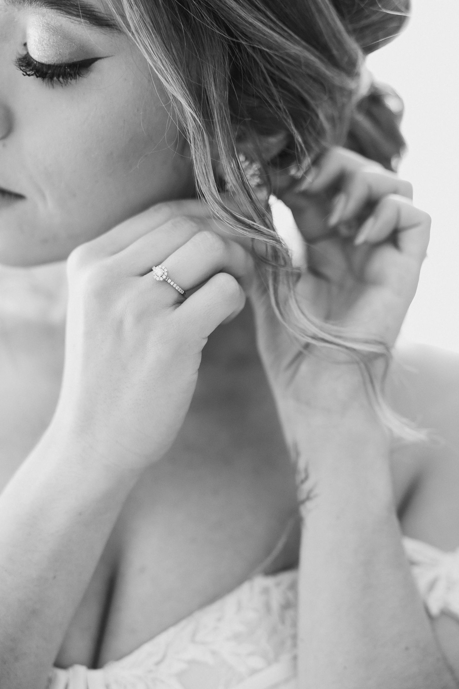 Black and white wedding photography sequence showing a bride's elegant profile with delicate jewelry and upswept hair.