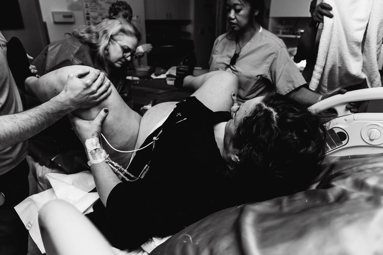 Laboring mother pushes her baby out during delivery in San Antonio Hospital