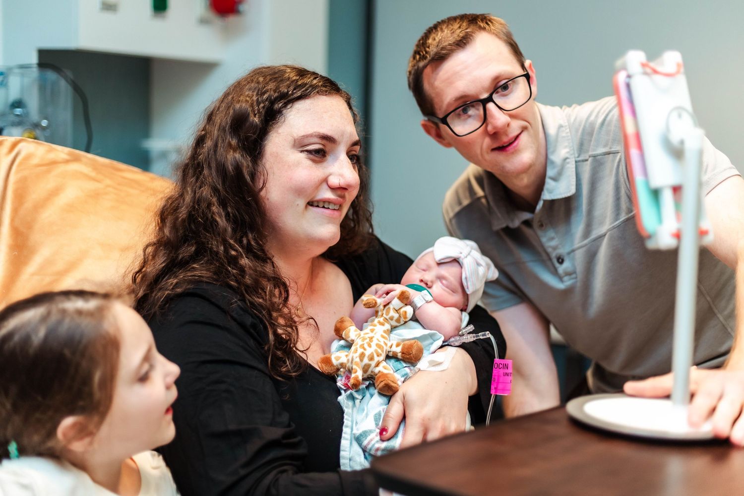 Family makes phone calls to announce baby