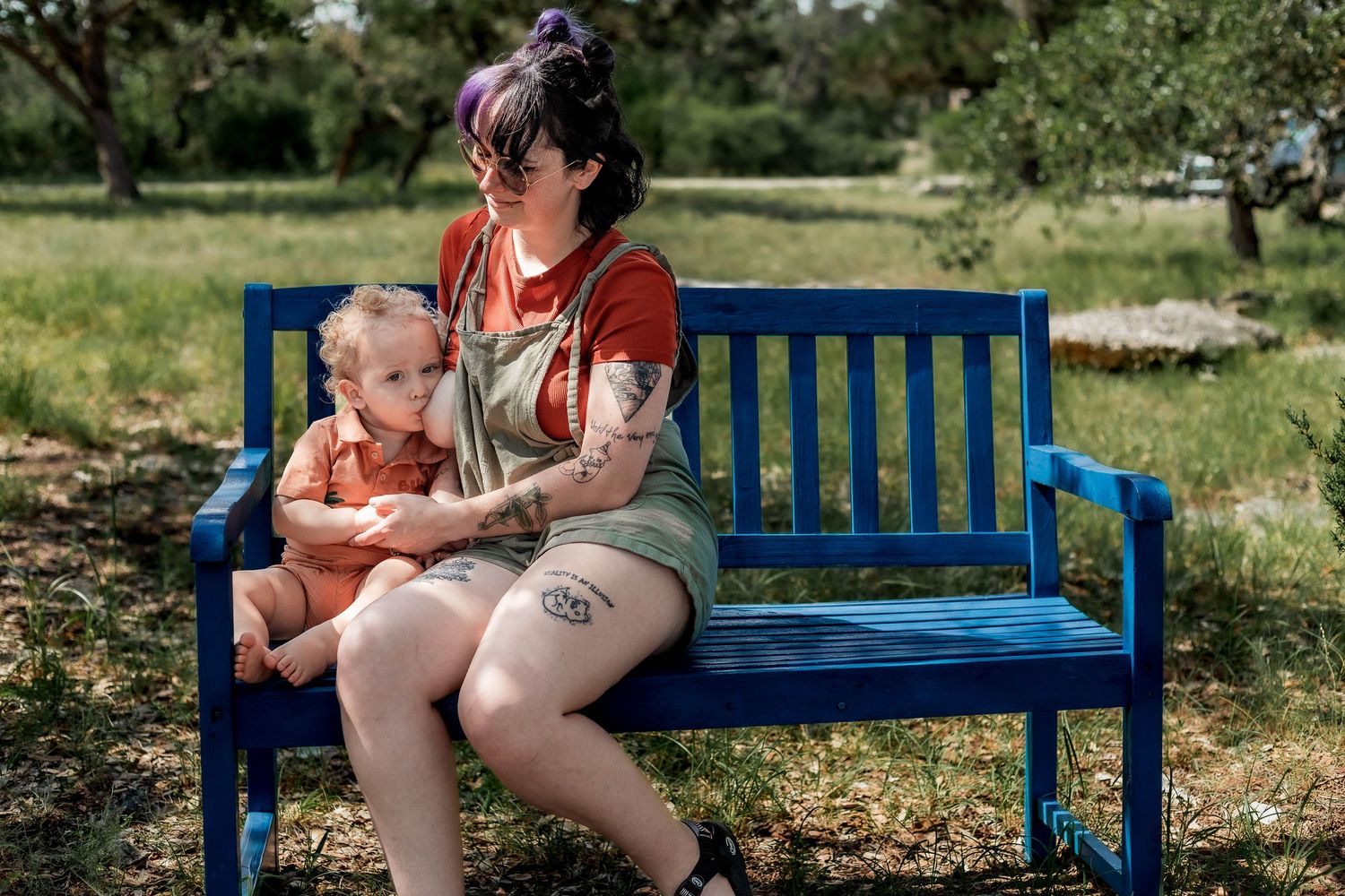 mother nurses big boy on benhc