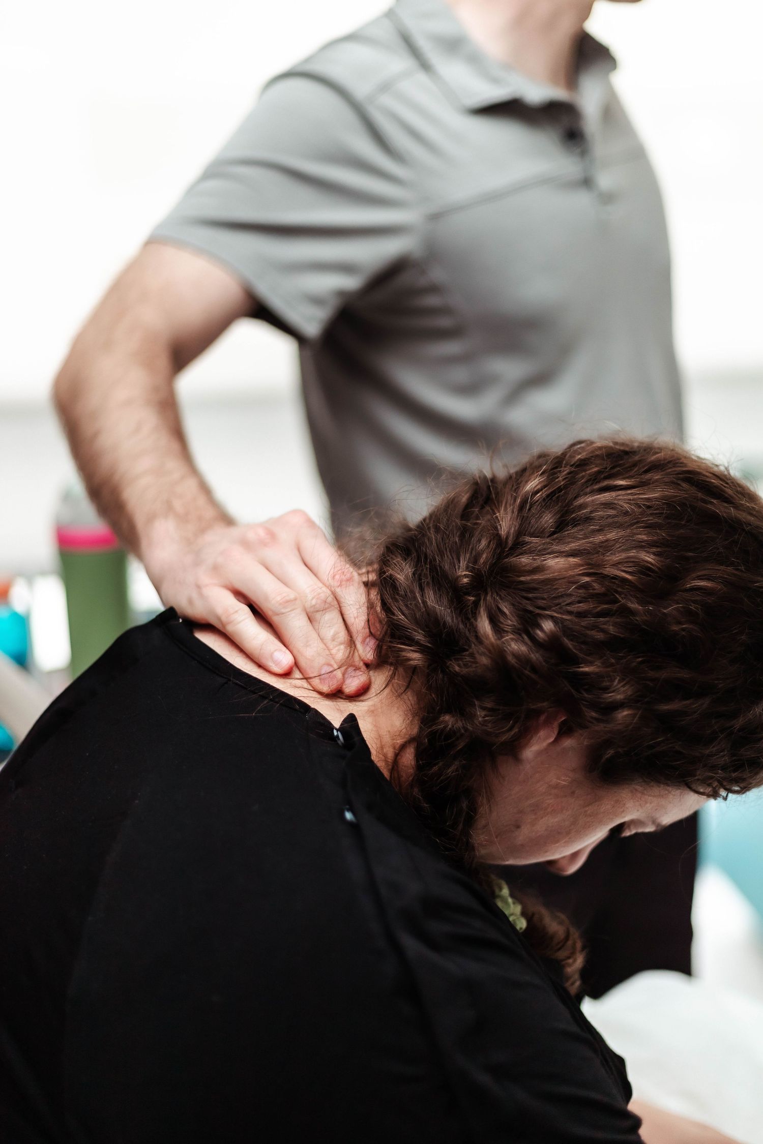 Husband massages wife's neck during labor