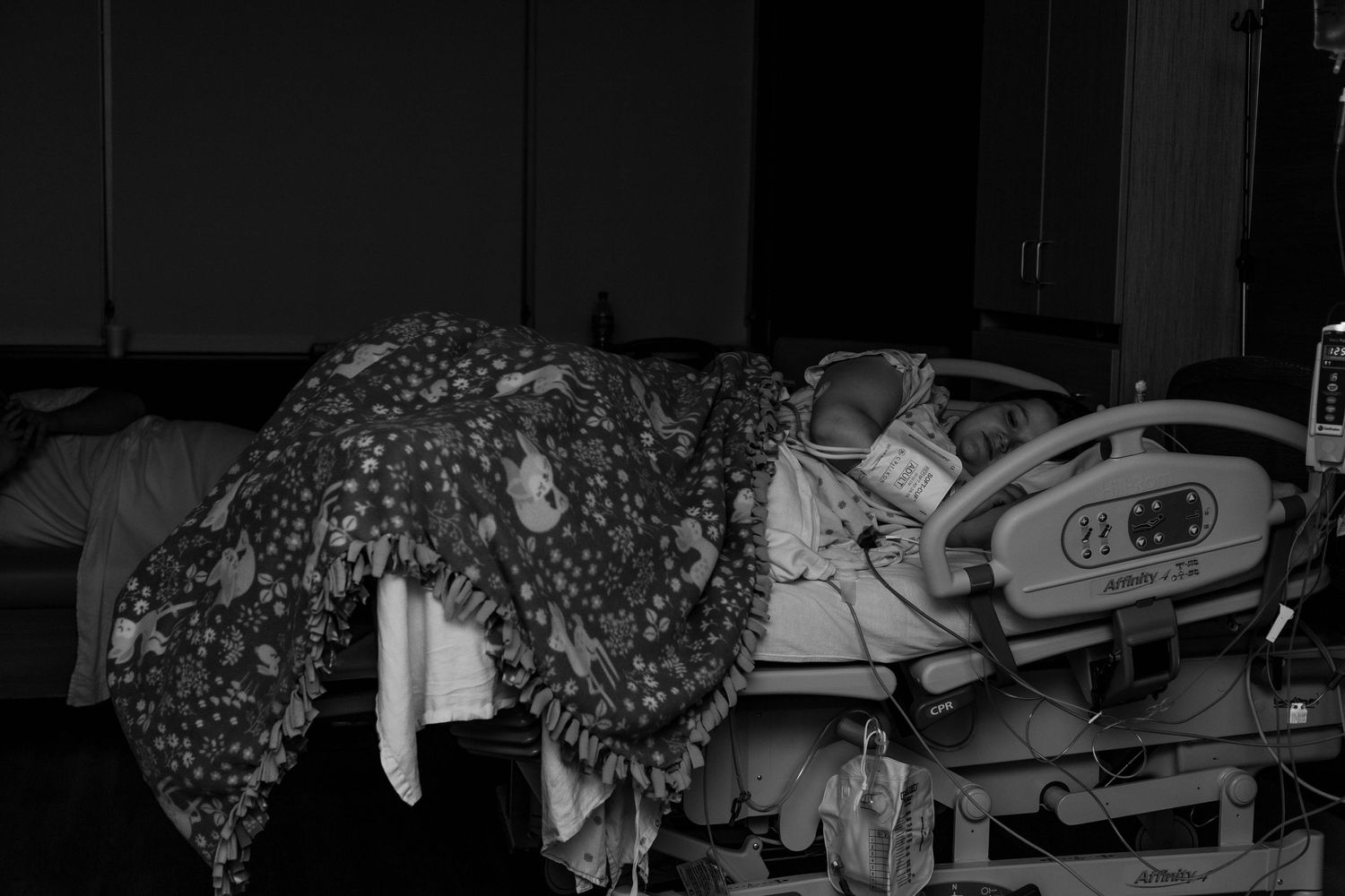 laboring mother trying to sleep during induction