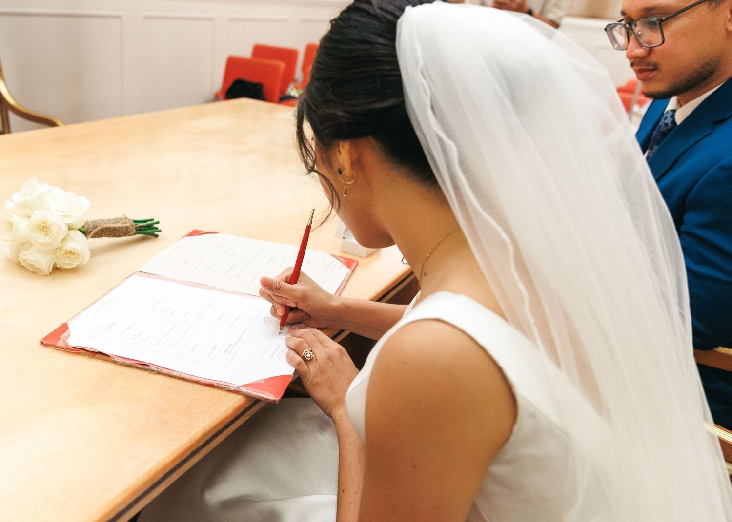 Students work together at desks in a classroom during a study session. Civil Ceremony in Hong Kong