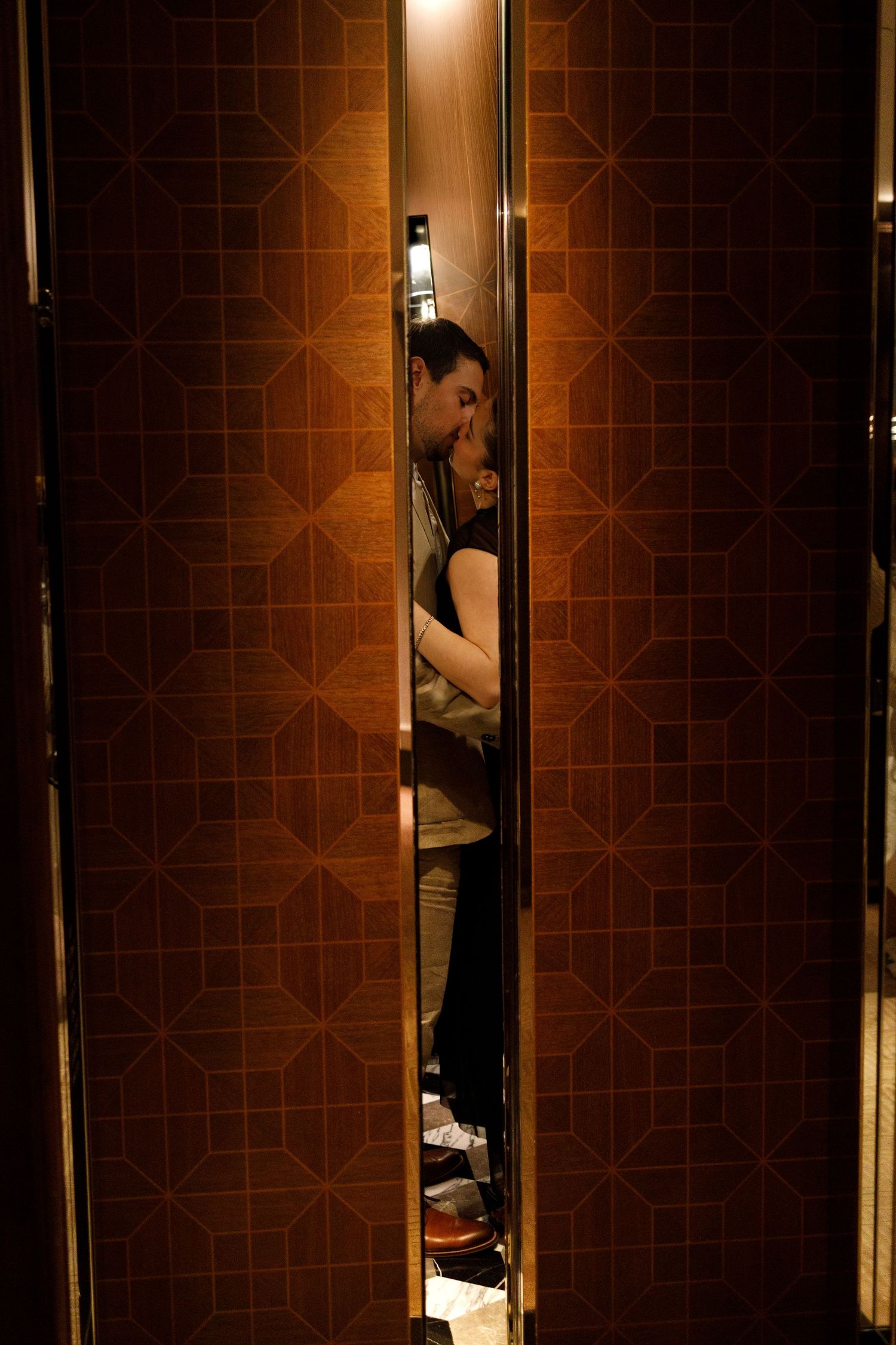 Romantic couple sharing an intimate moment in Rosewood Hong Kong. Pre Wedding in Hong Kong. Surprise proposal in Hong Kong