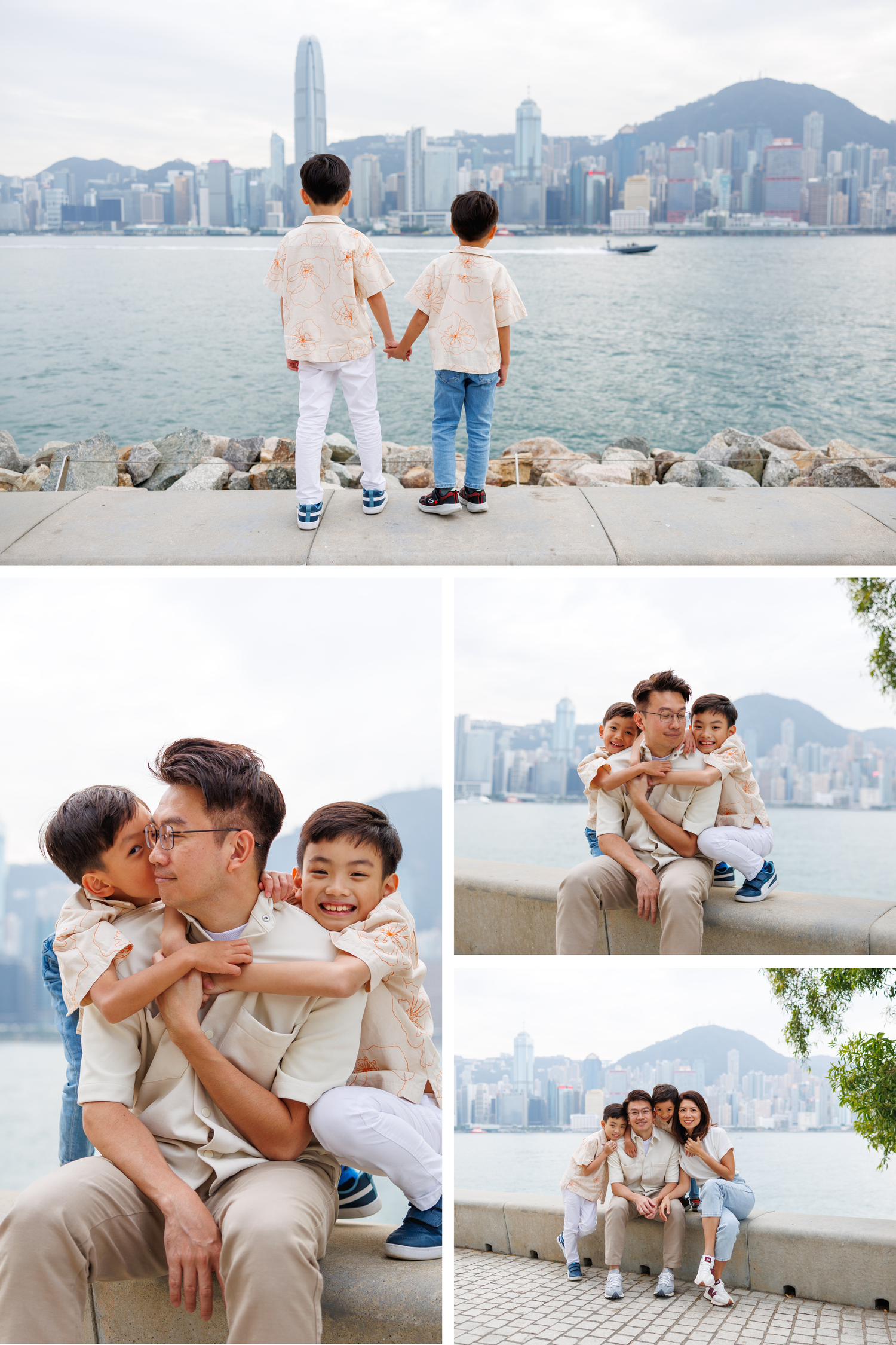 Family enjoying a sunny day at Hong Kong's Victoria Harbour with iconic skyline and mountains in background. Hong Kong Family Photographer