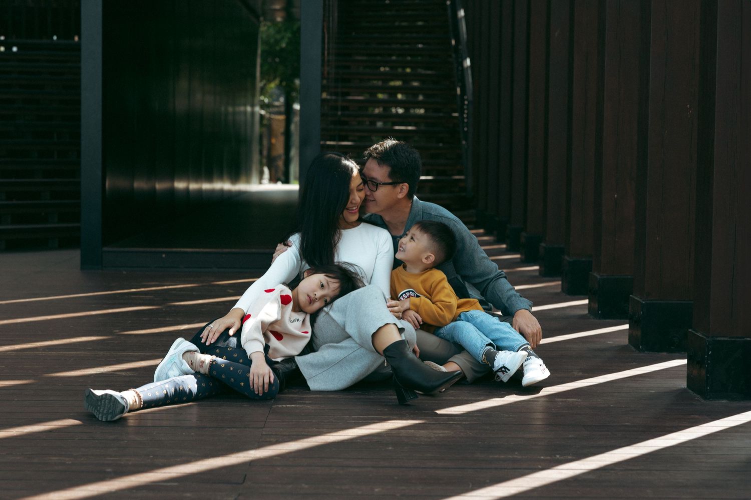 Family spending quality time together. Family Photographer in Hong Kong in West Kowloon Art Park. Natural and Candid Photoshoot