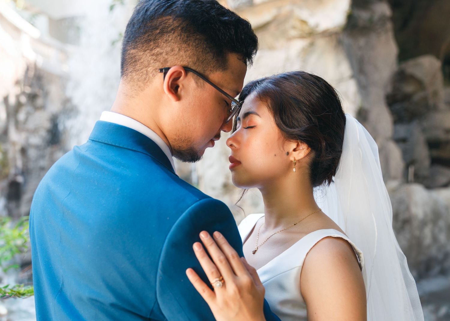 Romantic couple in wedding attire shares intimate moments in a series of black and white photographs. Civil Ceremony in Hong Kong