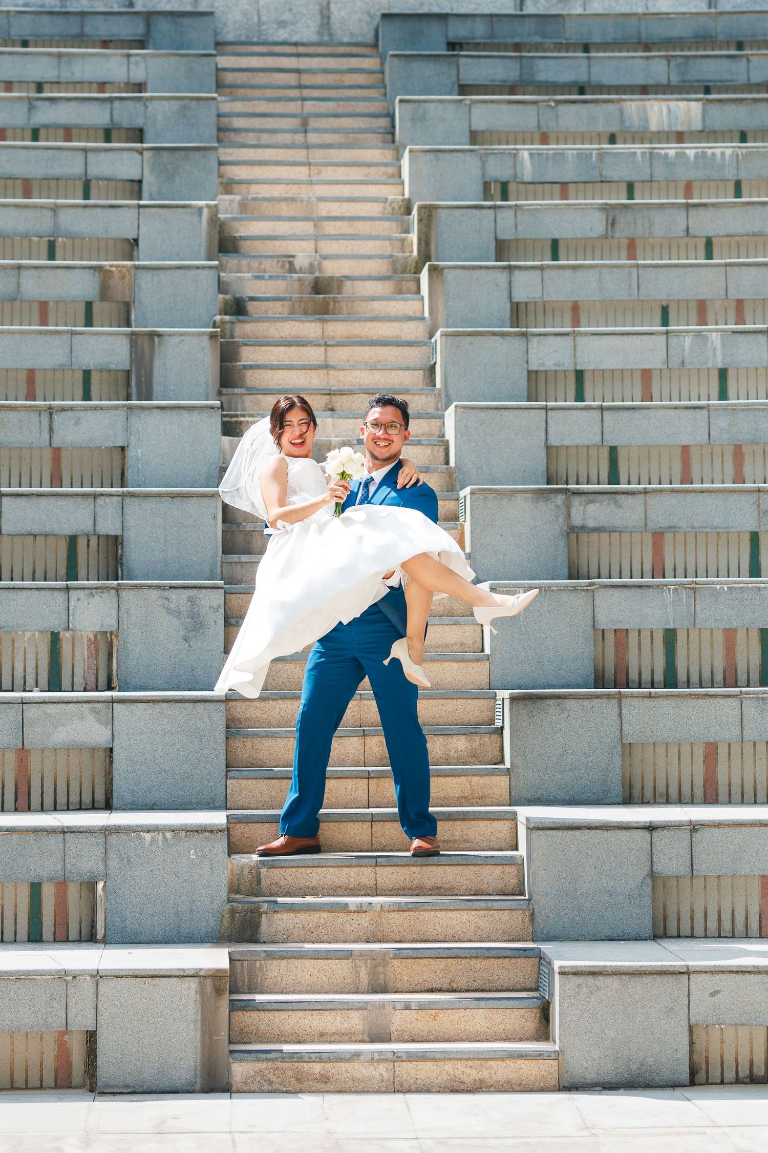 Sequence of dance-like movements performed on concrete stadium bleachers showing dynamic athletic poses. Civil Ceremony in Hong Kong
