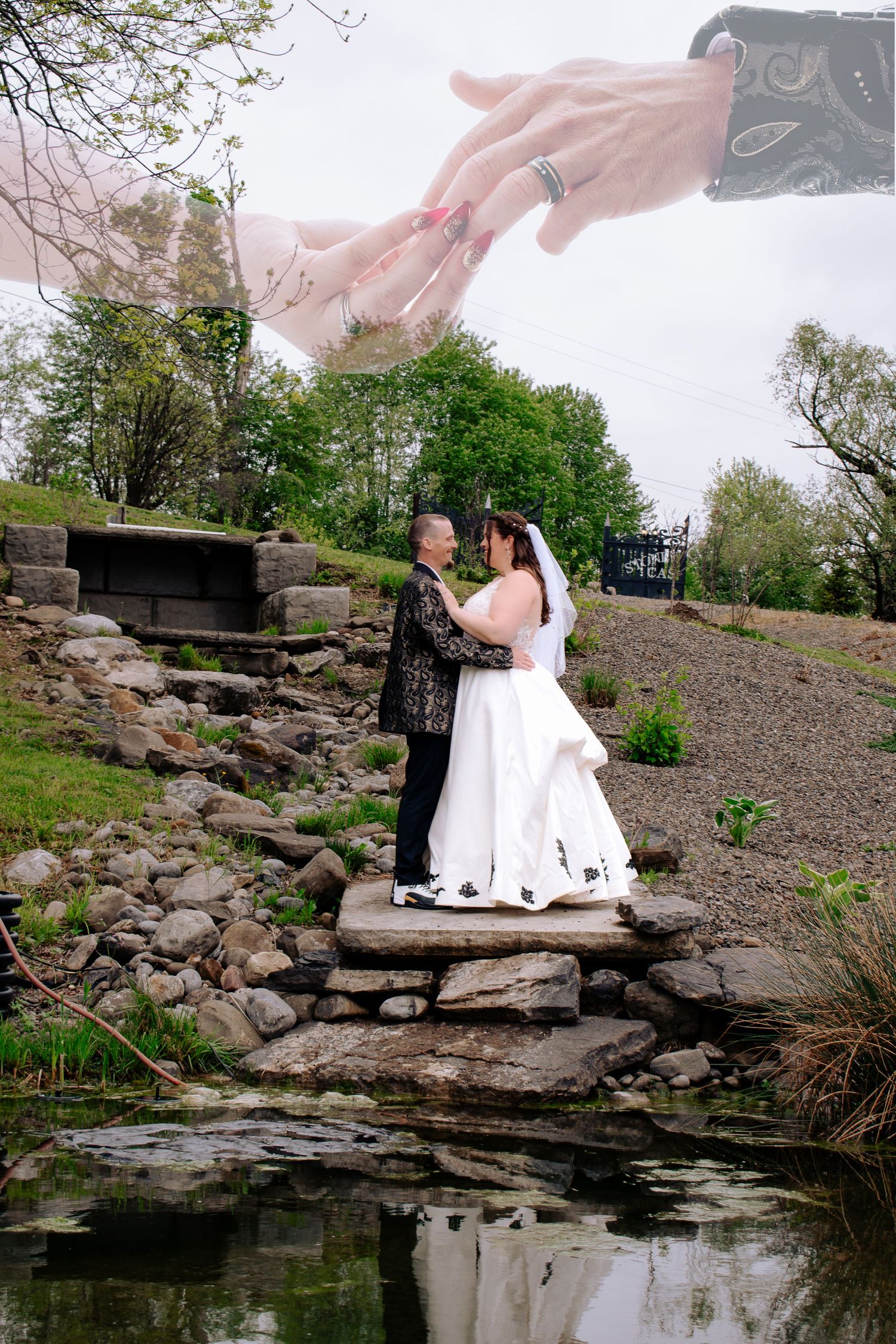 Wedding couple embracing on stone steps by a pond, with a close-up of rings overlay in a romantic outdoor setting.