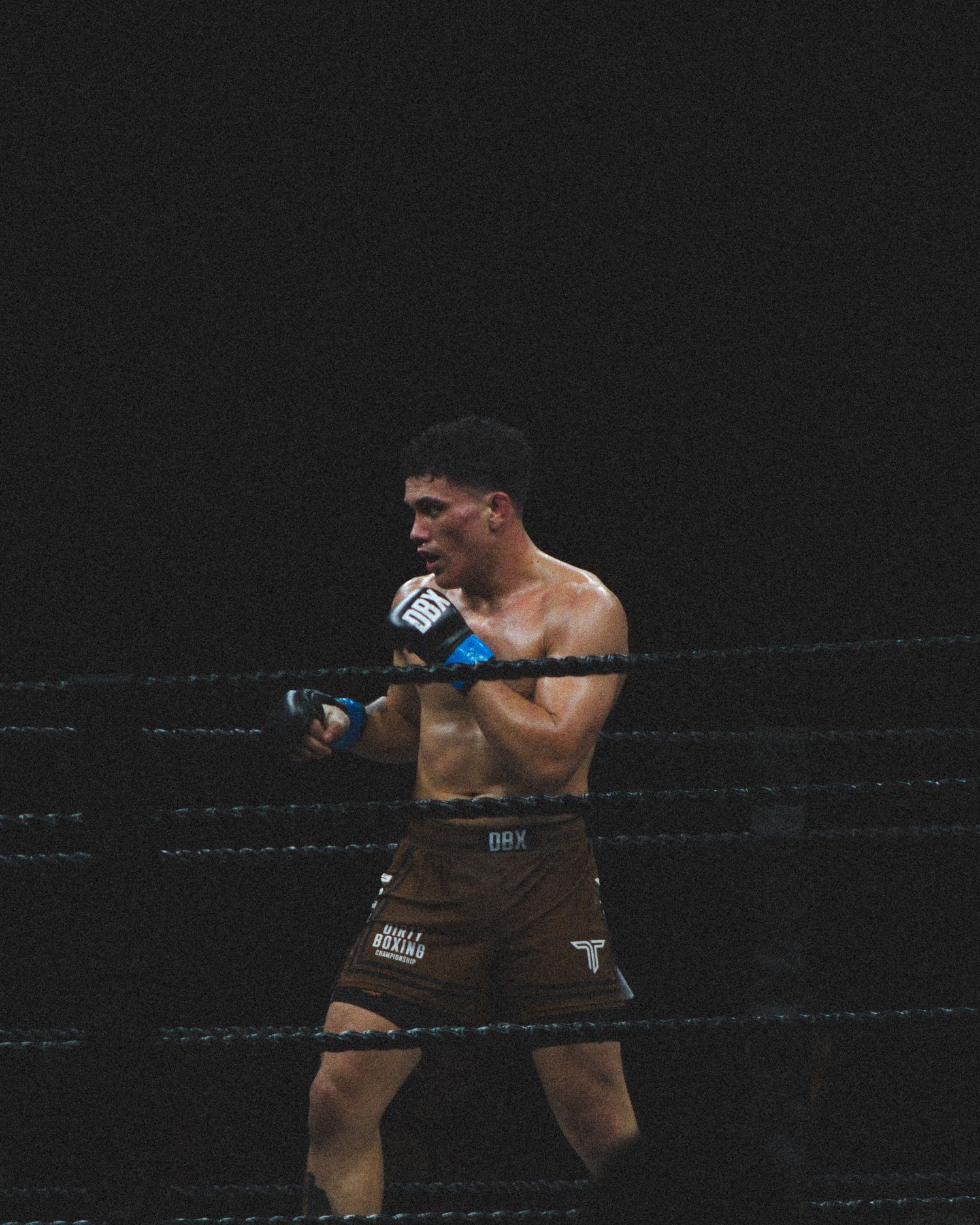 Two fighters engage in close combat during a professional MMA bout.