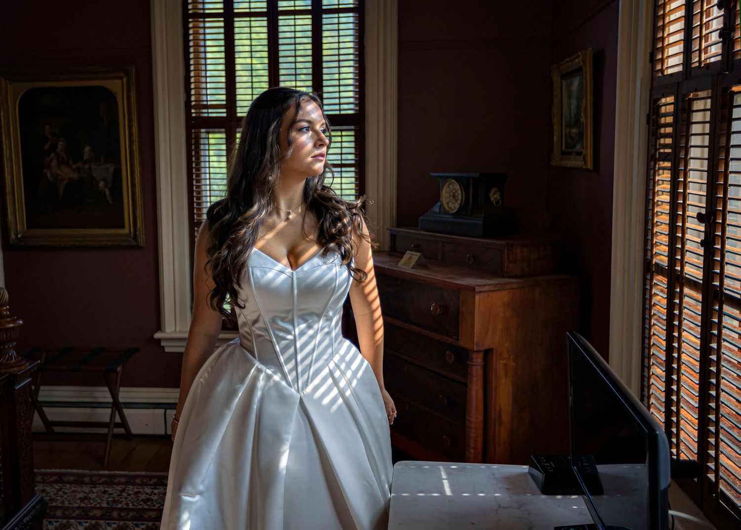 The Mansion of Saratoga wedding, bride in window light