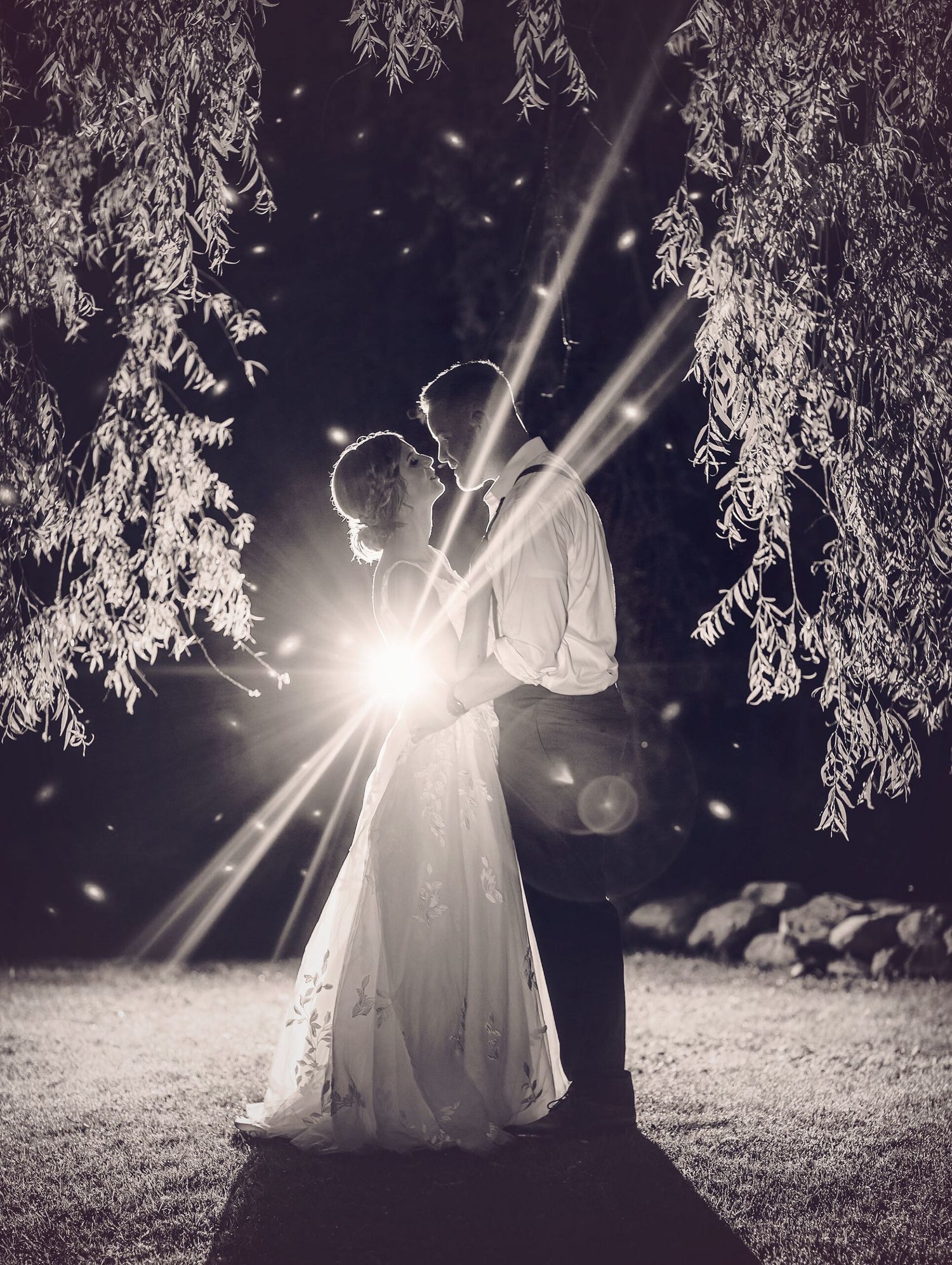 Old Daley on Crooked Lake Wedding bride and groom backlit night shots