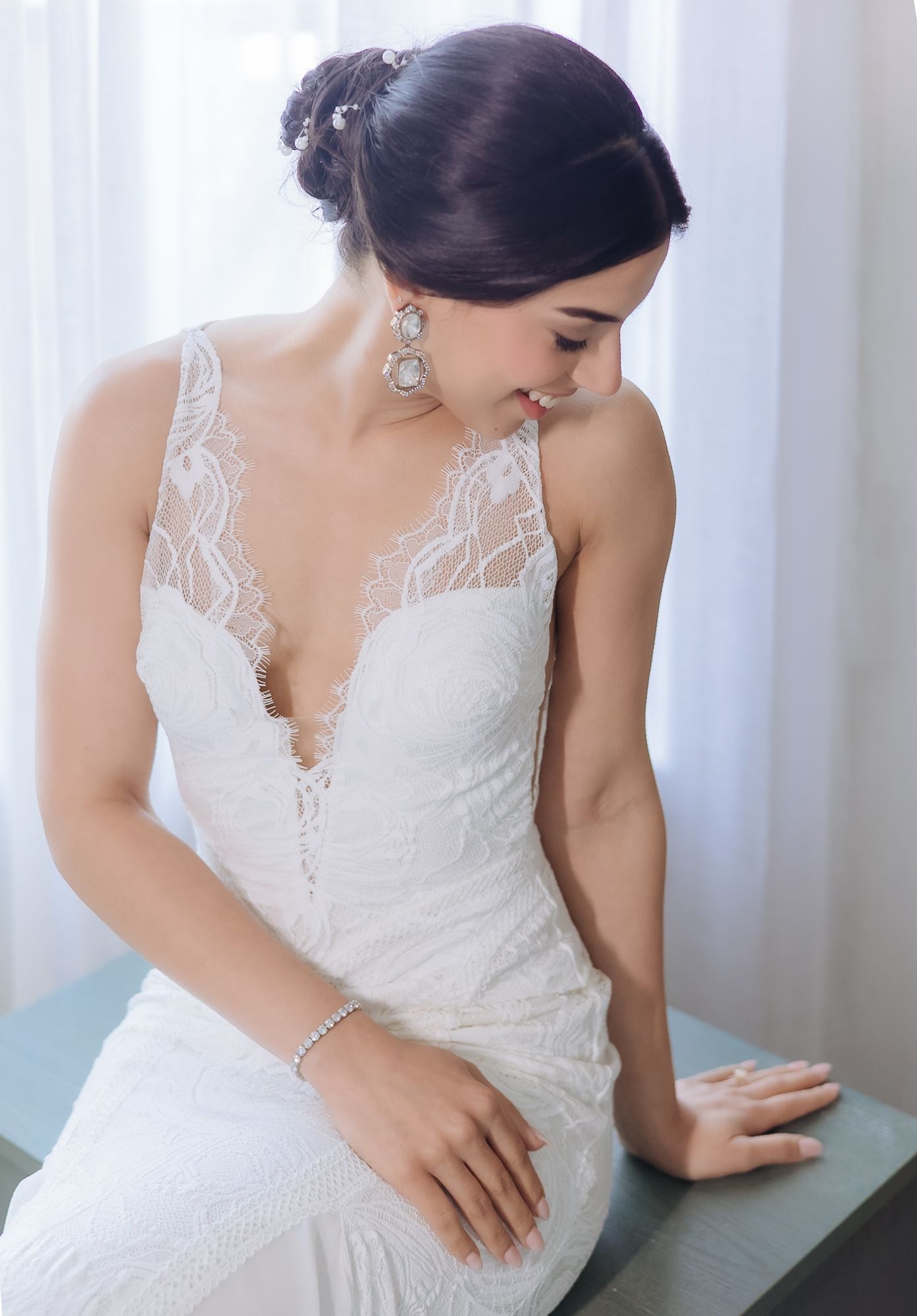 Bride Leah dressed in white for her intimate Christian wedding at Tivoli Chattarpur.