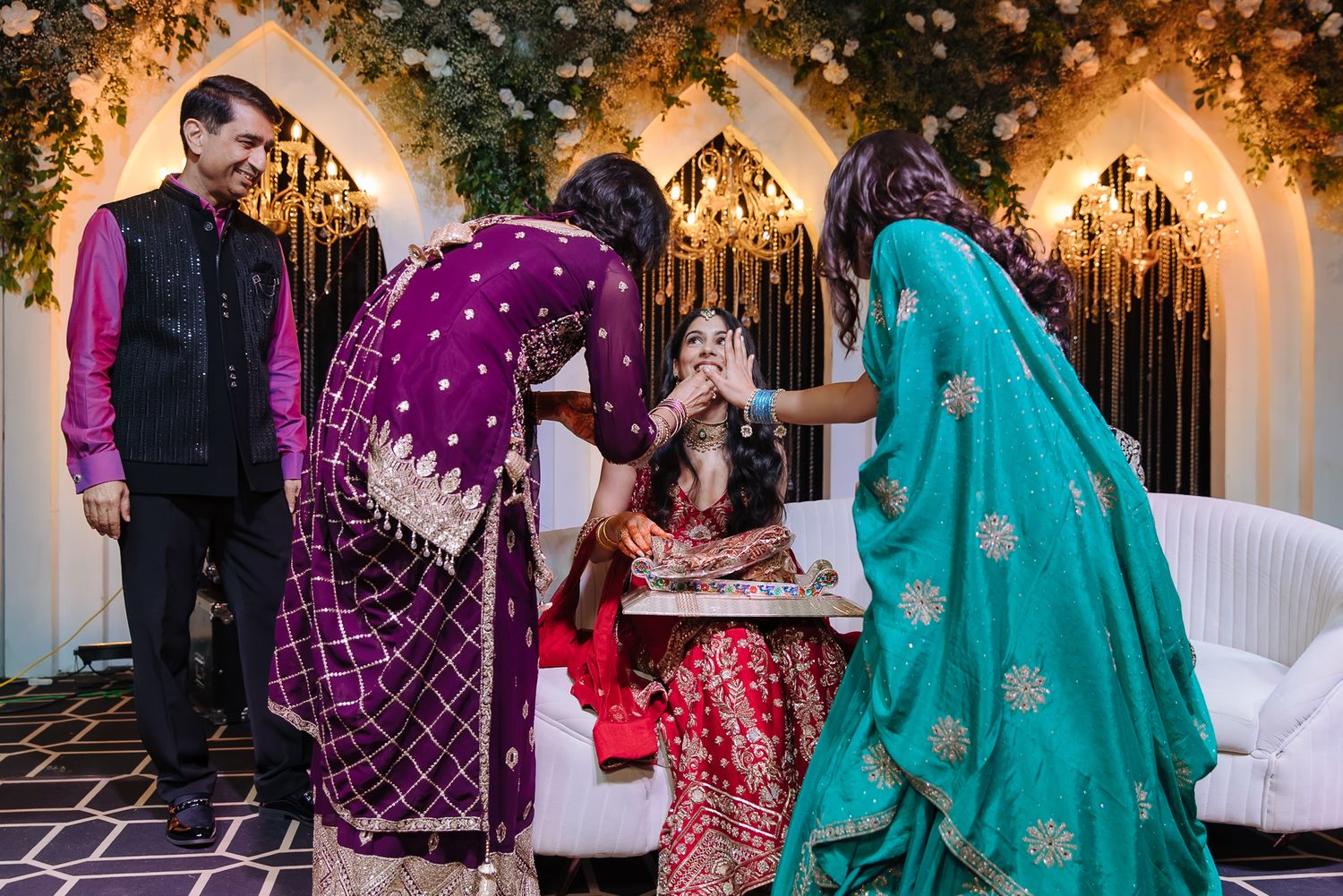 Leah welcomed by the elders of the family during her Sagan ceremony at Tivoli Chattarpur