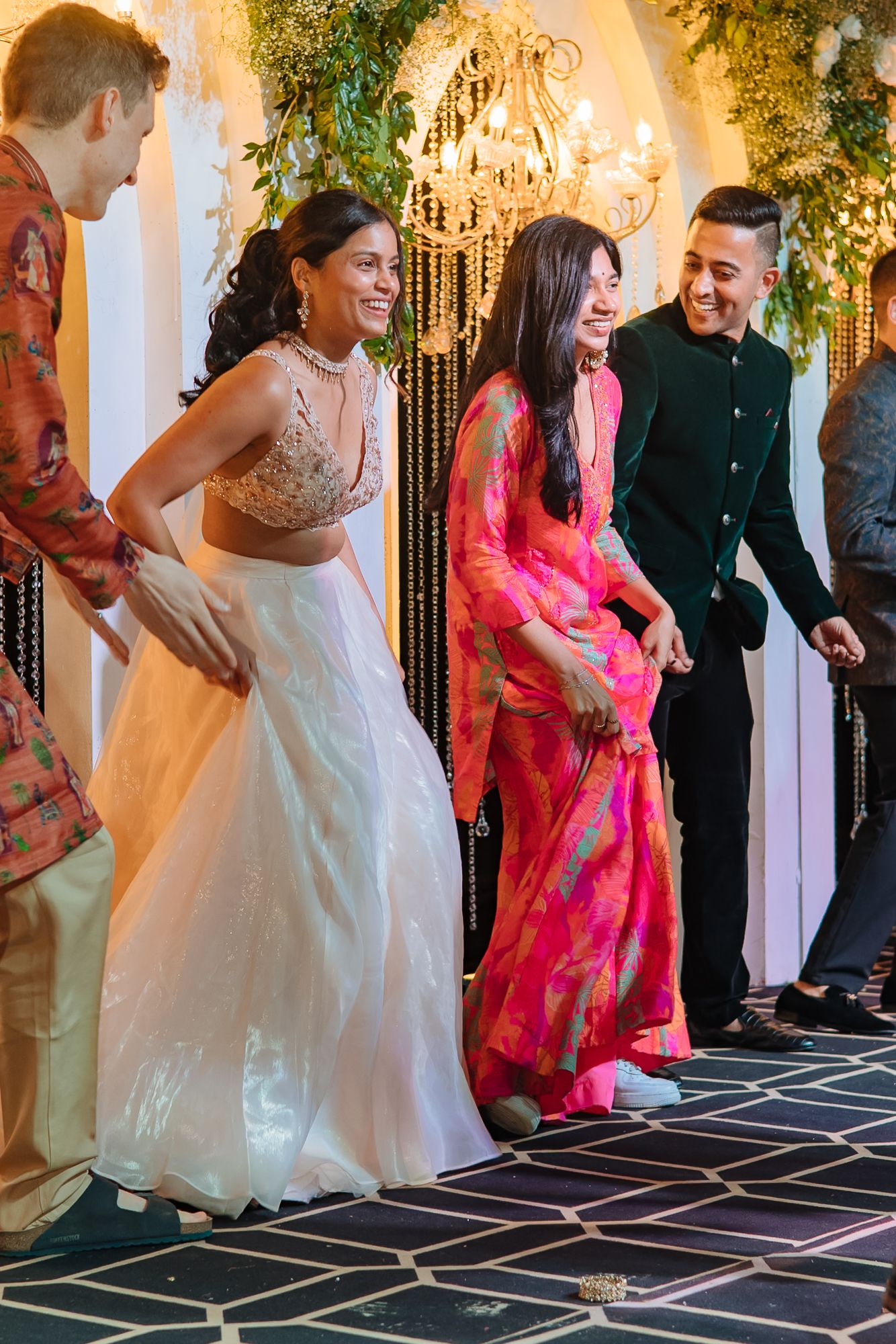 Friends celebrating Shorye and Leah with a lively Sangeet performance at Tivoli Chattarpur