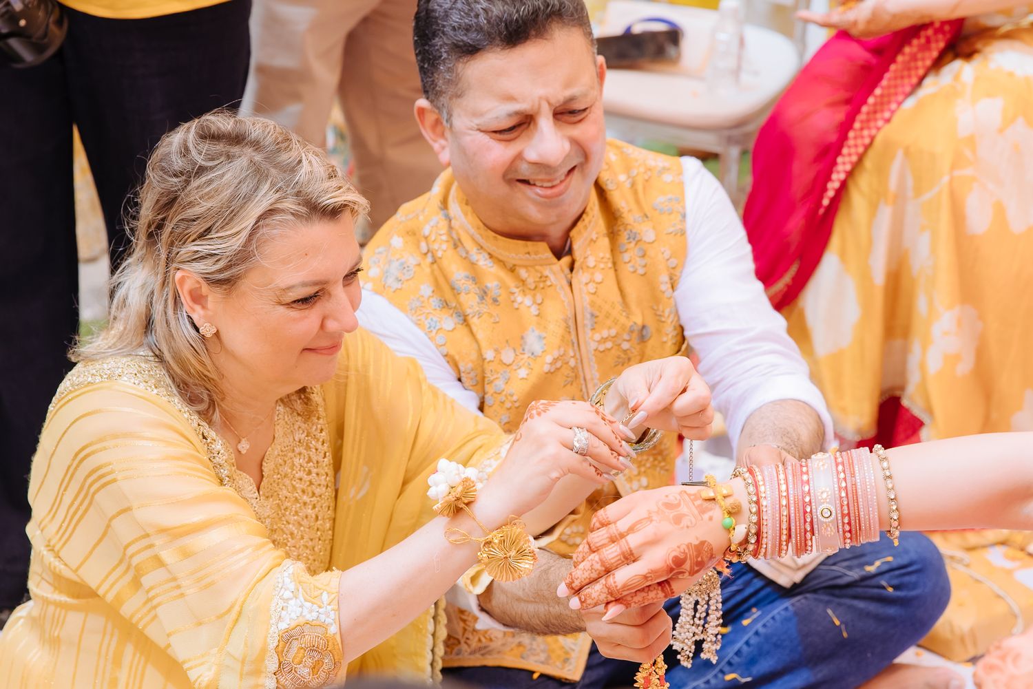 Family blessing Leah during her traditional chooda ceremony at Tivoli Chattarpur