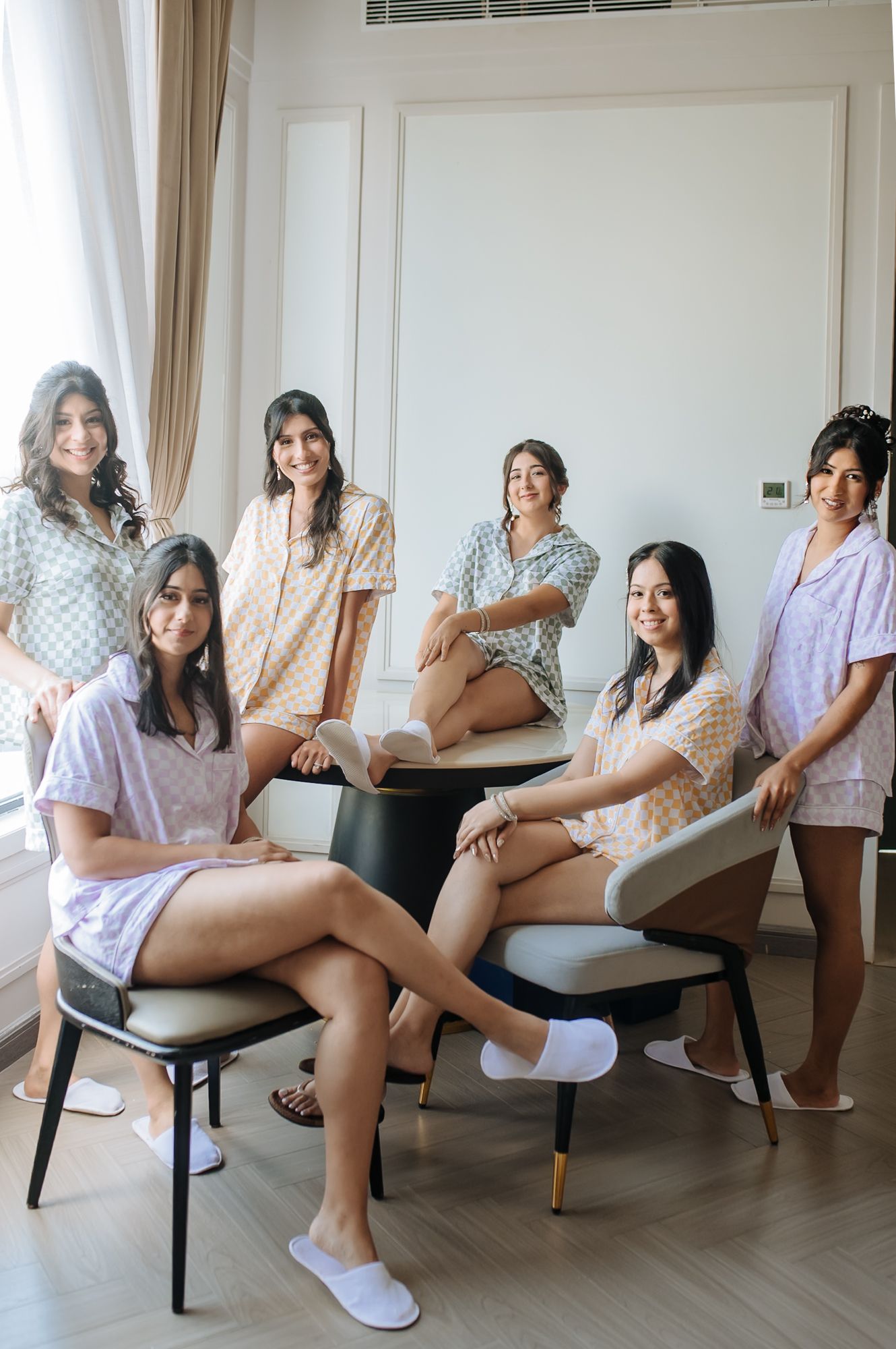 Bridesmaids celebrating with Leah during her wedding morning at Tivoli Chattarpur.