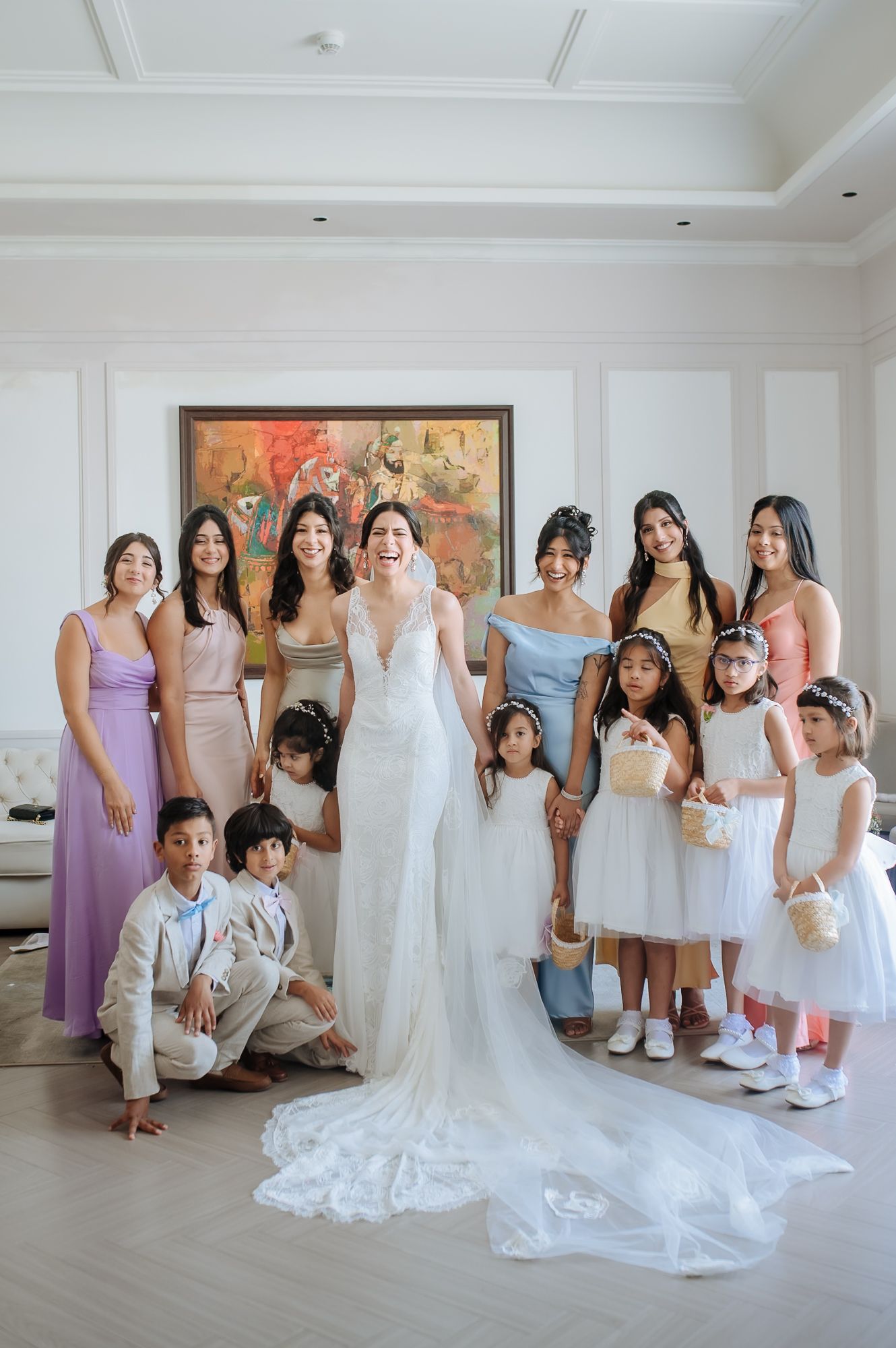 Leah surrounded by her bridesmaids as she gets ready for her wedding ceremony at Tivoli Chattarpur.