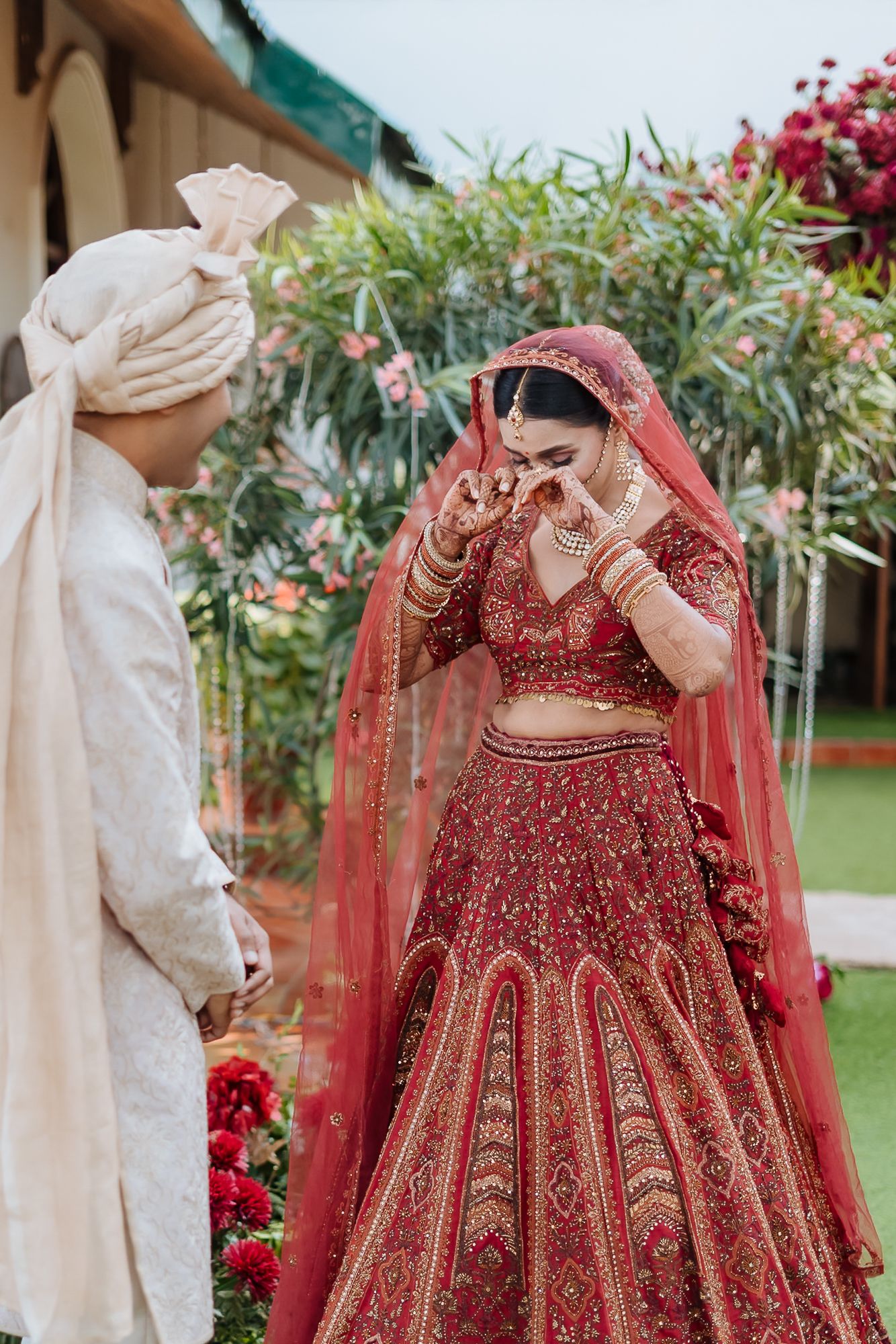 Hearty and honest first look of a bride and groom at their intimate wedding of 30 people in the hills at Daleside Manor, Kasauli