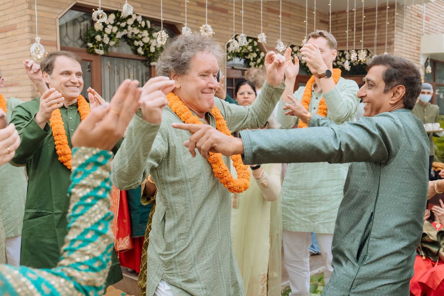 Punjabi Mehendi celebration with dhol entry and Norwegian family experiencing an Indian Mehendi ceremony for the first time