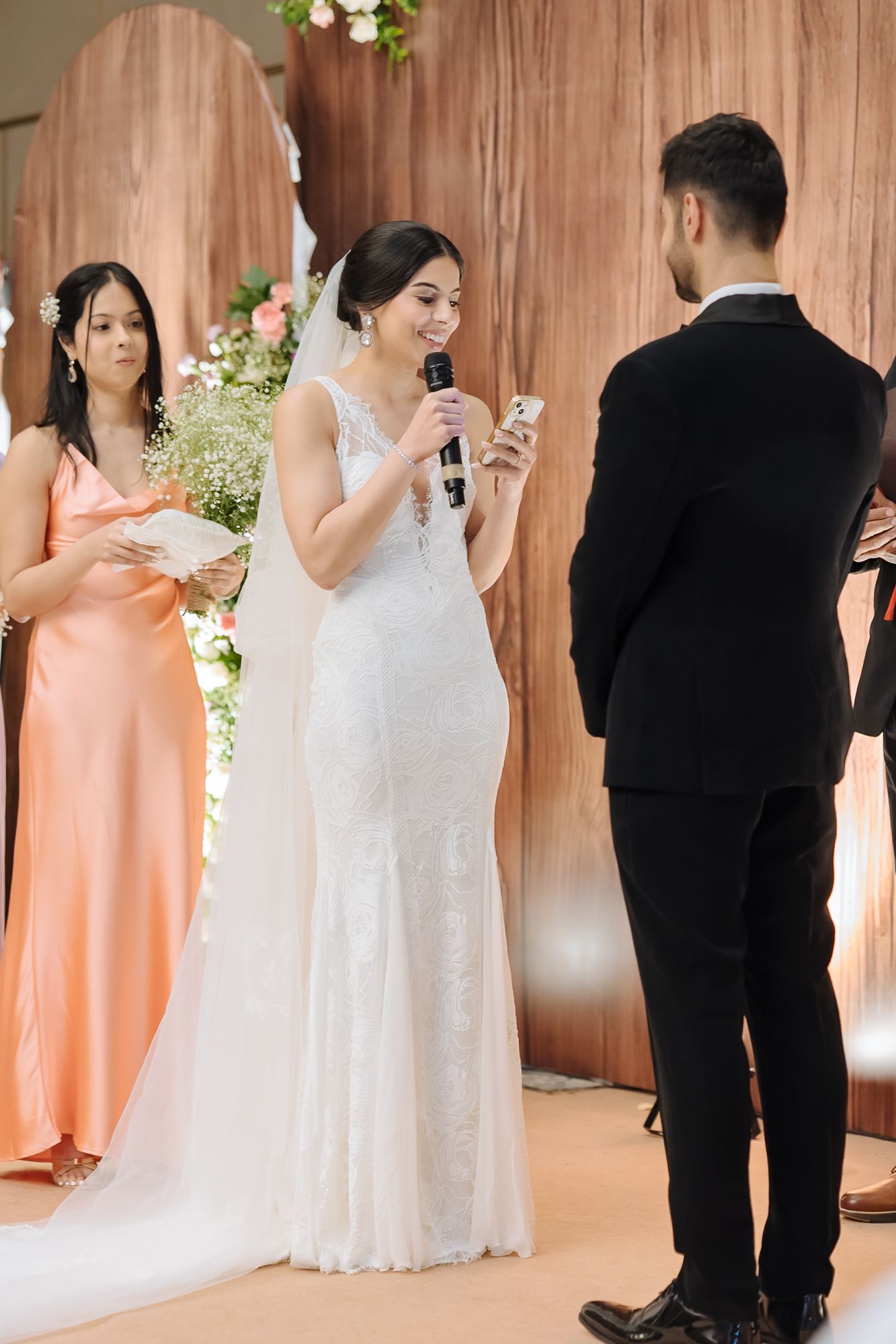 Shorye and Leah exchanging emotional vows during their Christian wedding at Tivoli Chattarpur