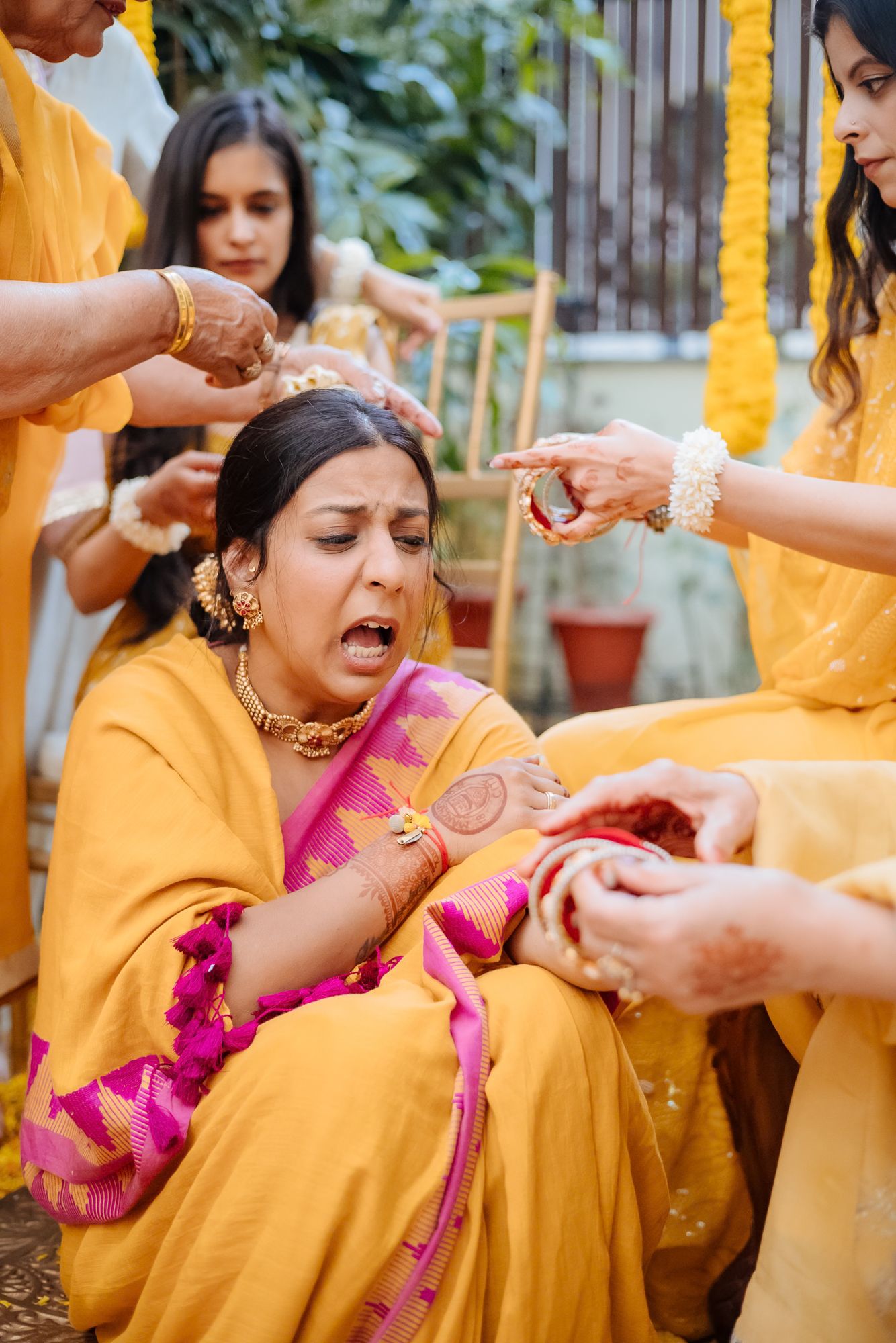 Traditional Punjabi Chooda ceremony captured in a candid storytelling style during an indo-norwegian wedding in Chandigarh