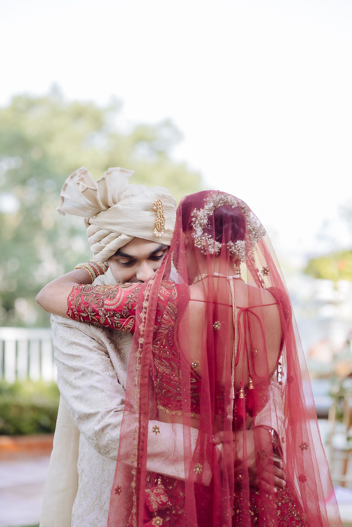 Hearty and honest first look of a bride and groom at their intimate wedding of 30 people in the hills at Daleside Manor, Kasauli