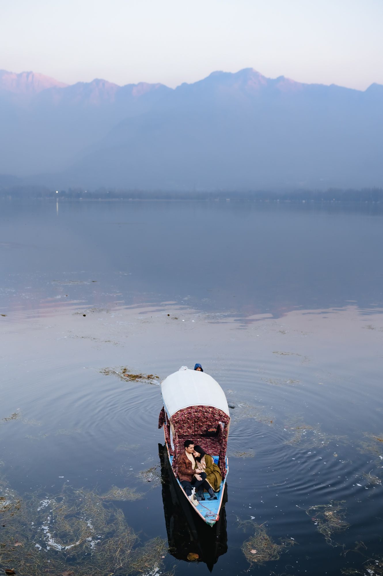 Romantic fine-art and heartfelt pre-wedding portraits in the scenic valleys of Srinagar's Dal Lake.