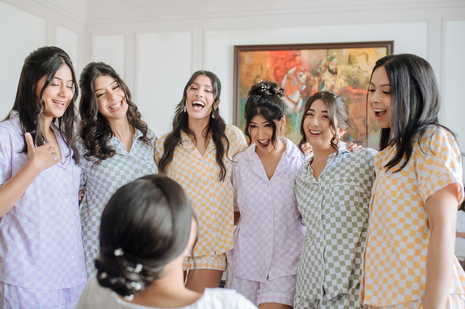 Bridesmaids celebrating with Leah during her wedding morning at Tivoli Chattarpur.