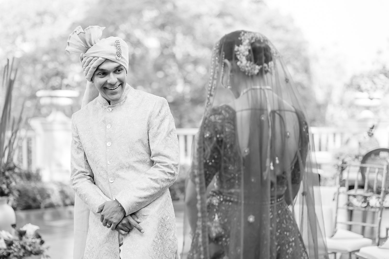 Indian groom in off-white sherwani and with a very happy reaction during candid first look at Daleside Manor Kasauli