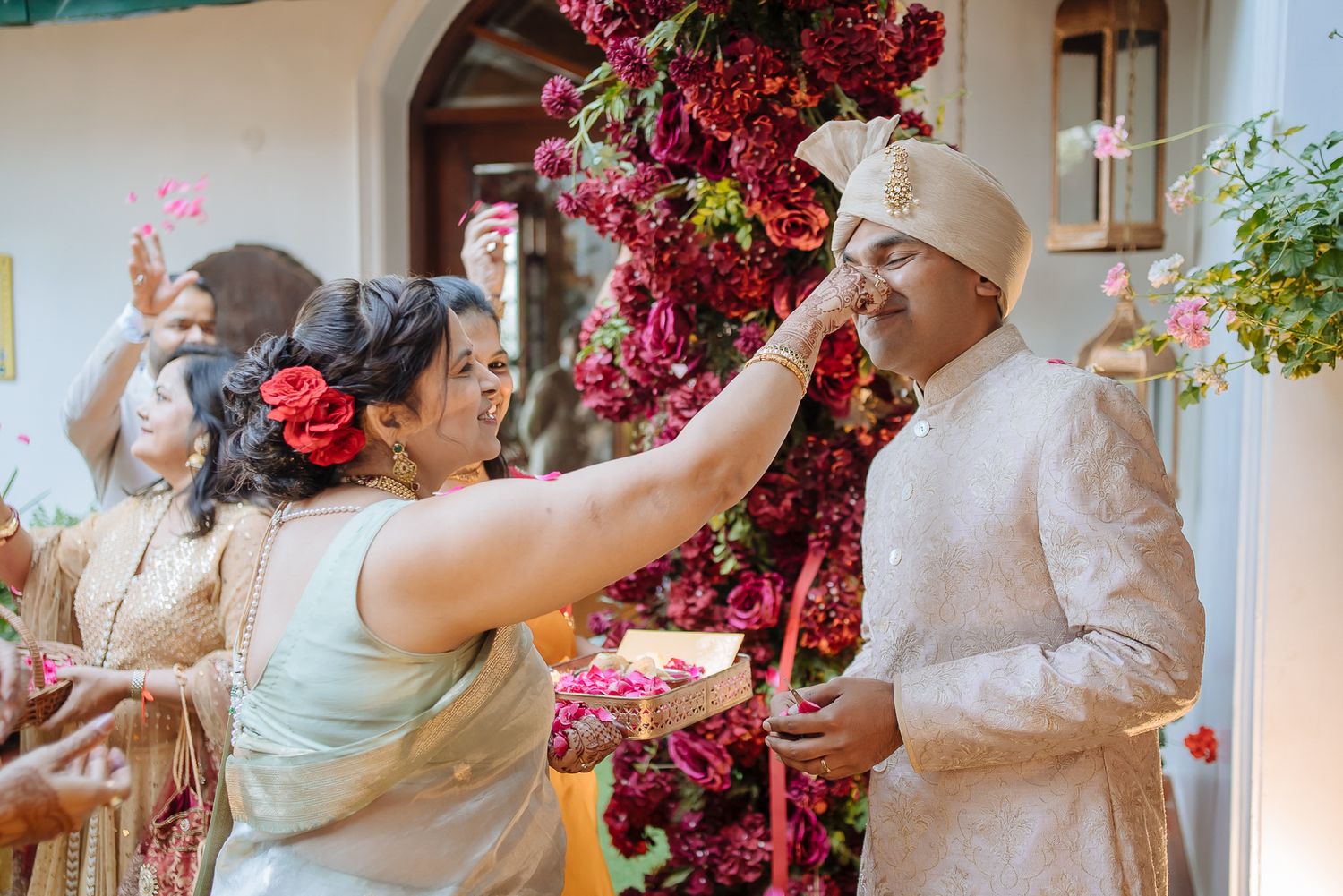 Indian groom welcome ceremony after an Indian baraat of an intimate wedding of 30 people in the hills at Daleside Manor, Kasauli