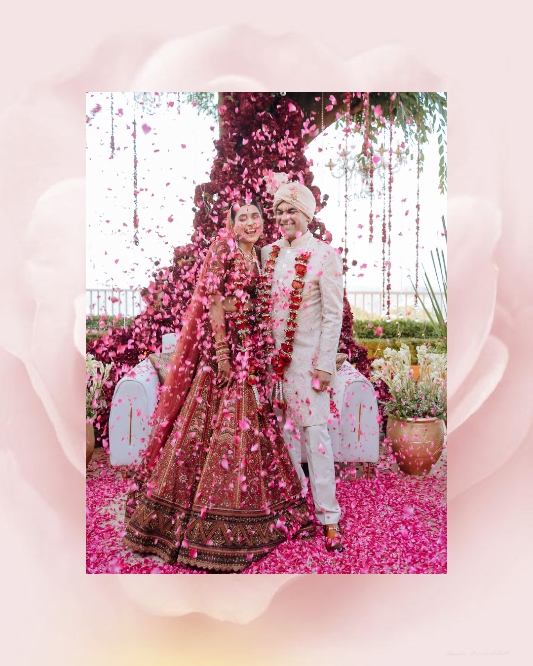 Happy couple portrait with a flower petal shower for an intimate 30 people  mountain wedding in the Himalayas at Daleside Manor, Kasauli.