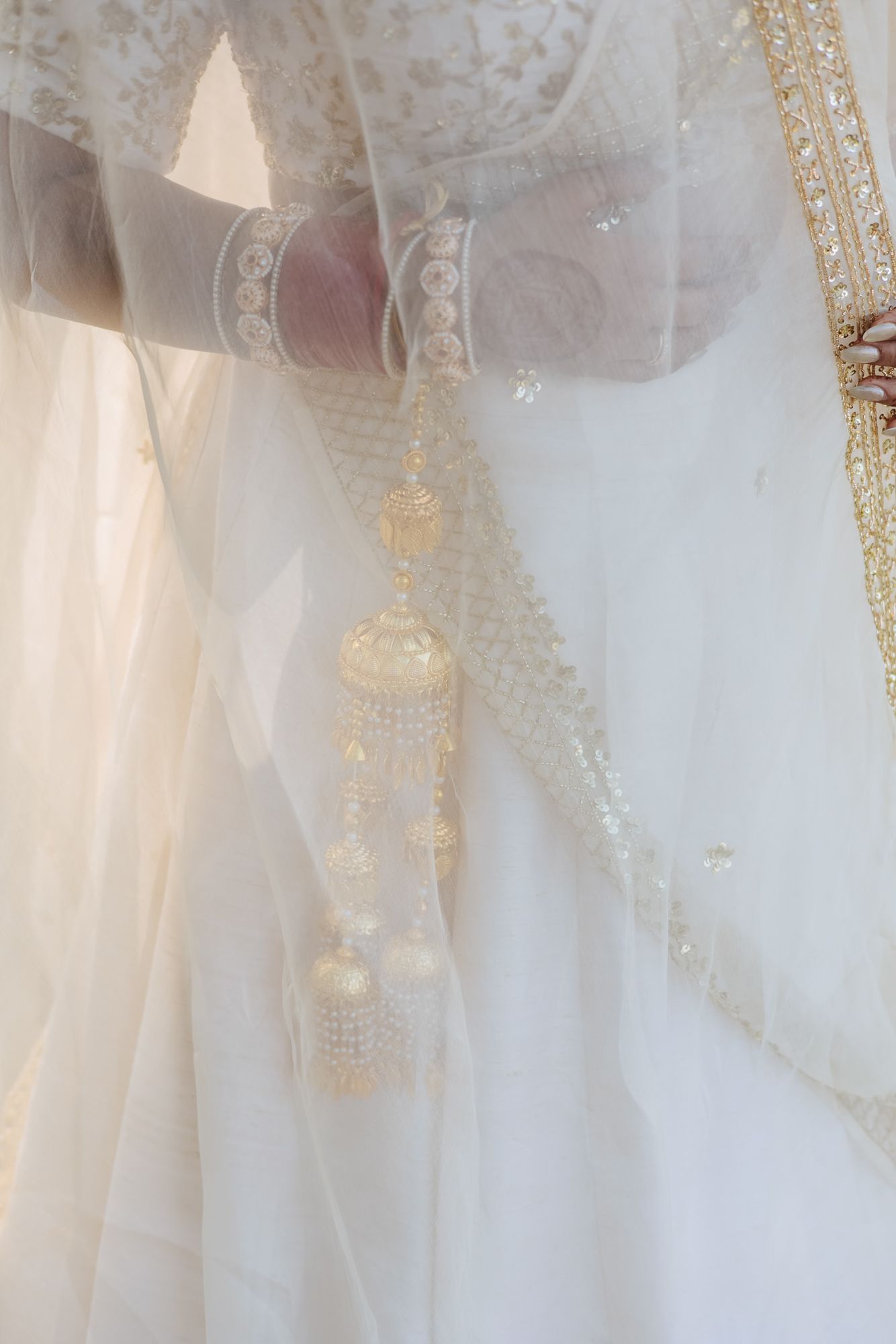 Elegant bridal portrait of Bride Itisha in an ivory lehenga for an intimate Indo-Norwegian wedding in Forest Hill, Chandigarh