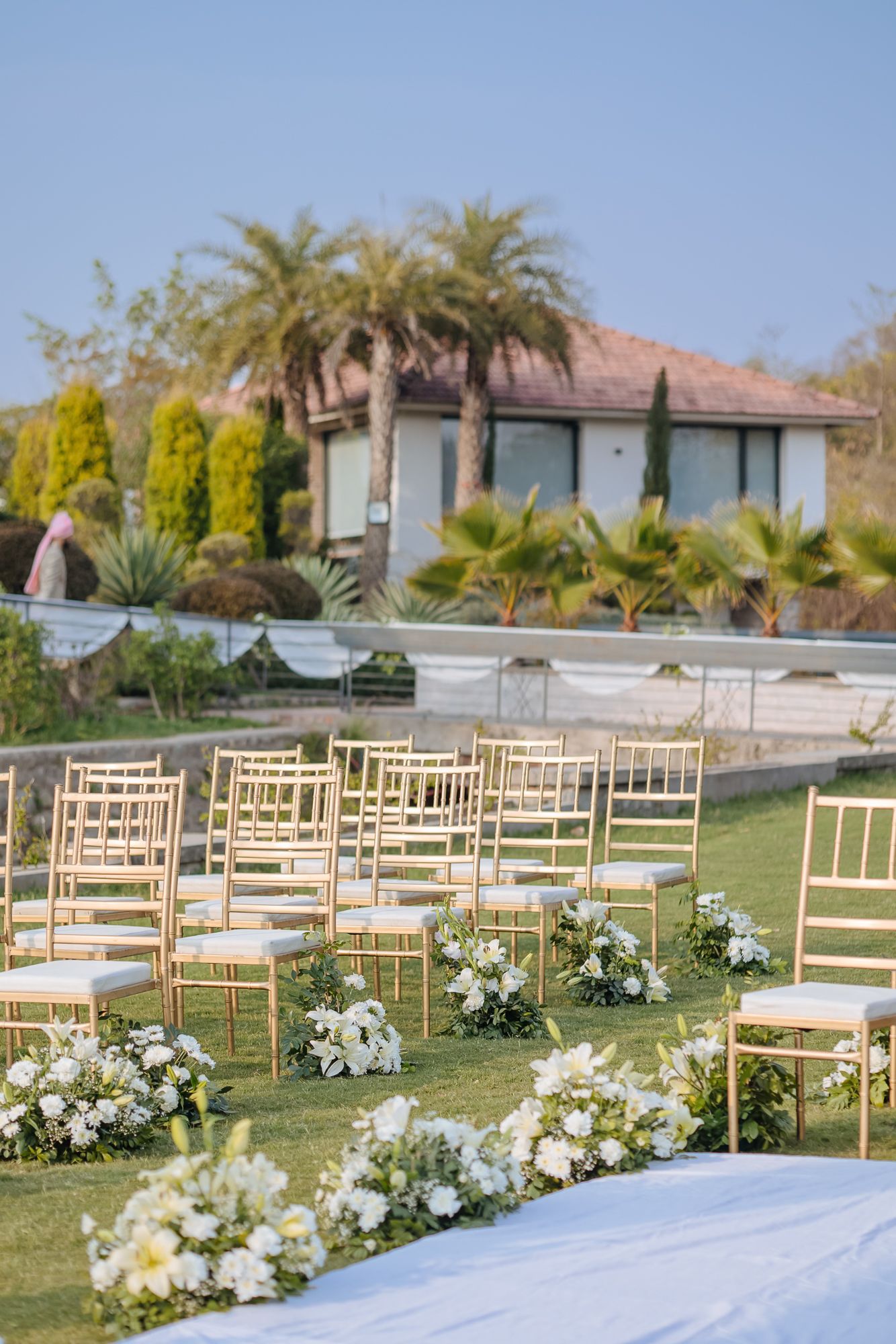 Minimal white floral mandap at Forest Hill for an intimate Indo-Norwegian wedding in Forest Hill, Chandigarh