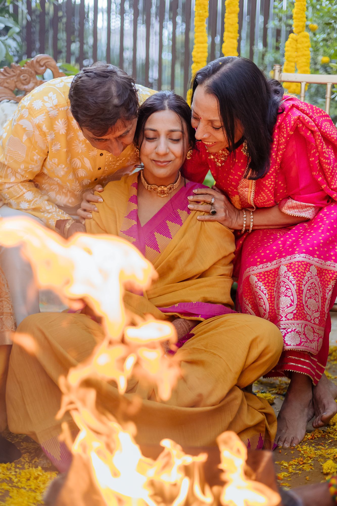 Bride Itisha during her intimate Chooda ceremony surrounded by family during her indo-norwegian wedding in Chandigarh
