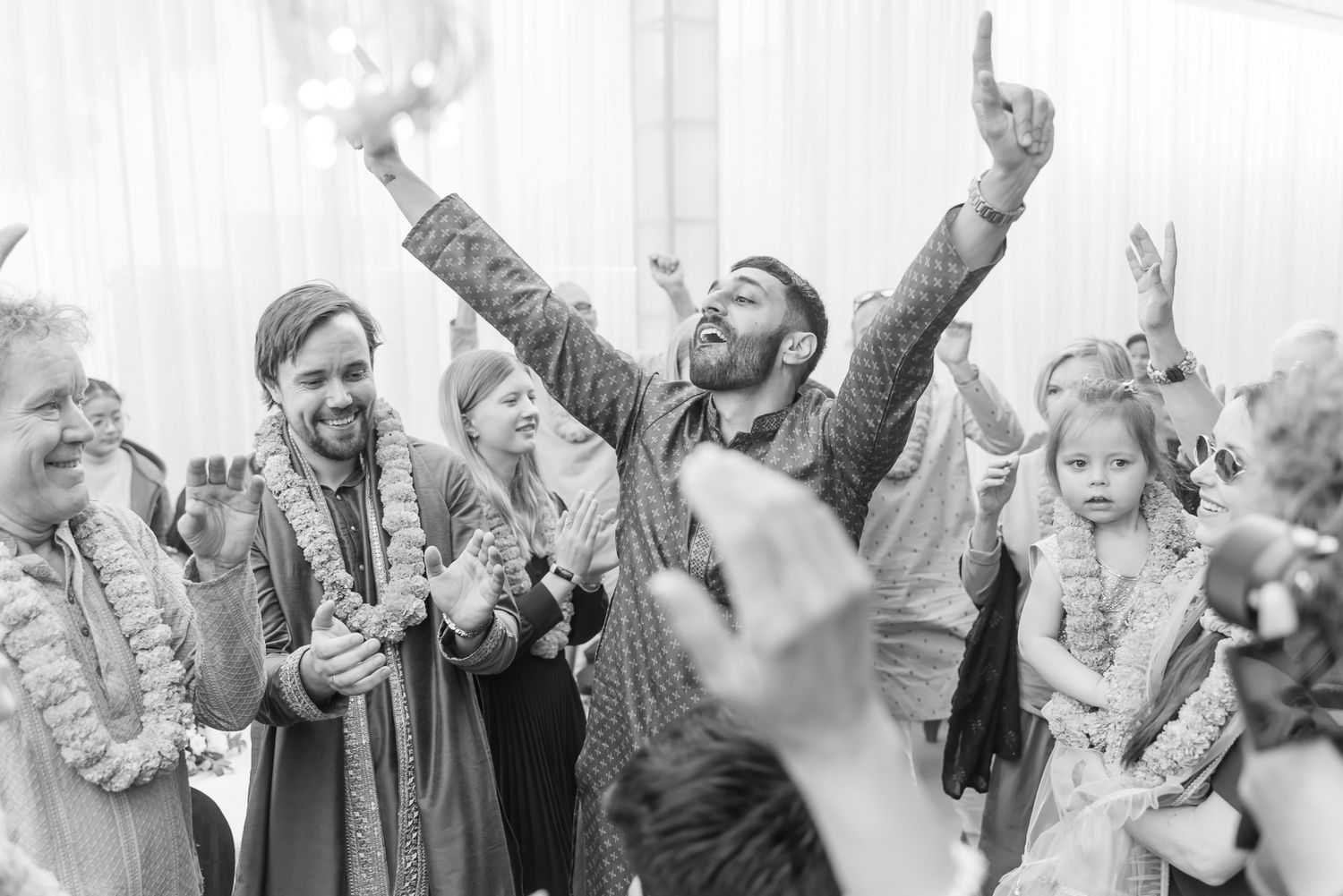 Punjabi Mehendi celebration with dhol entry and Norwegian family experiencing an Indian Mehendi ceremony for the first time