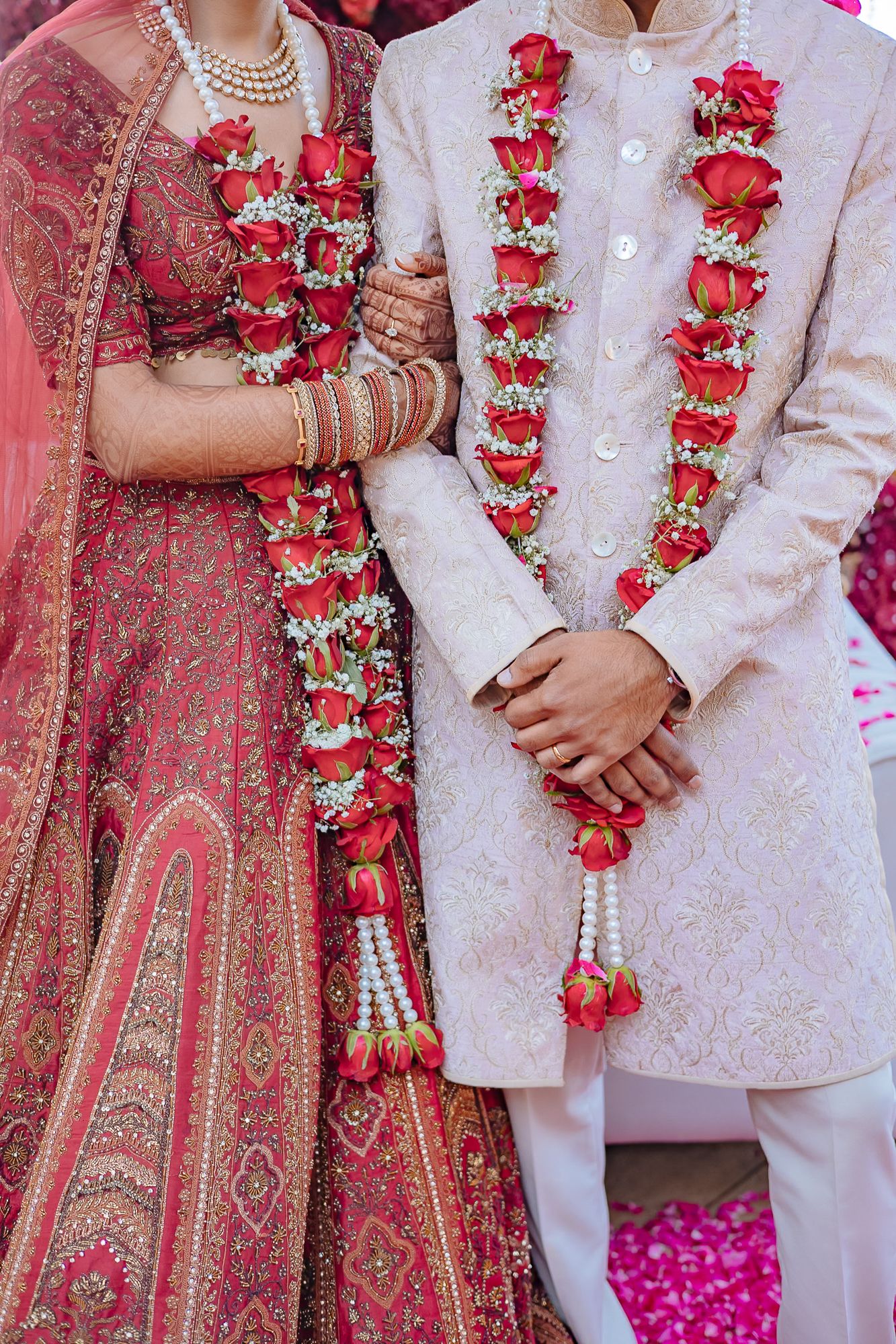 Indian Varmala with roses and baby breath details at an intimate wedding of 30 guests in the Himalayas at Daleside Manor, Kasauli