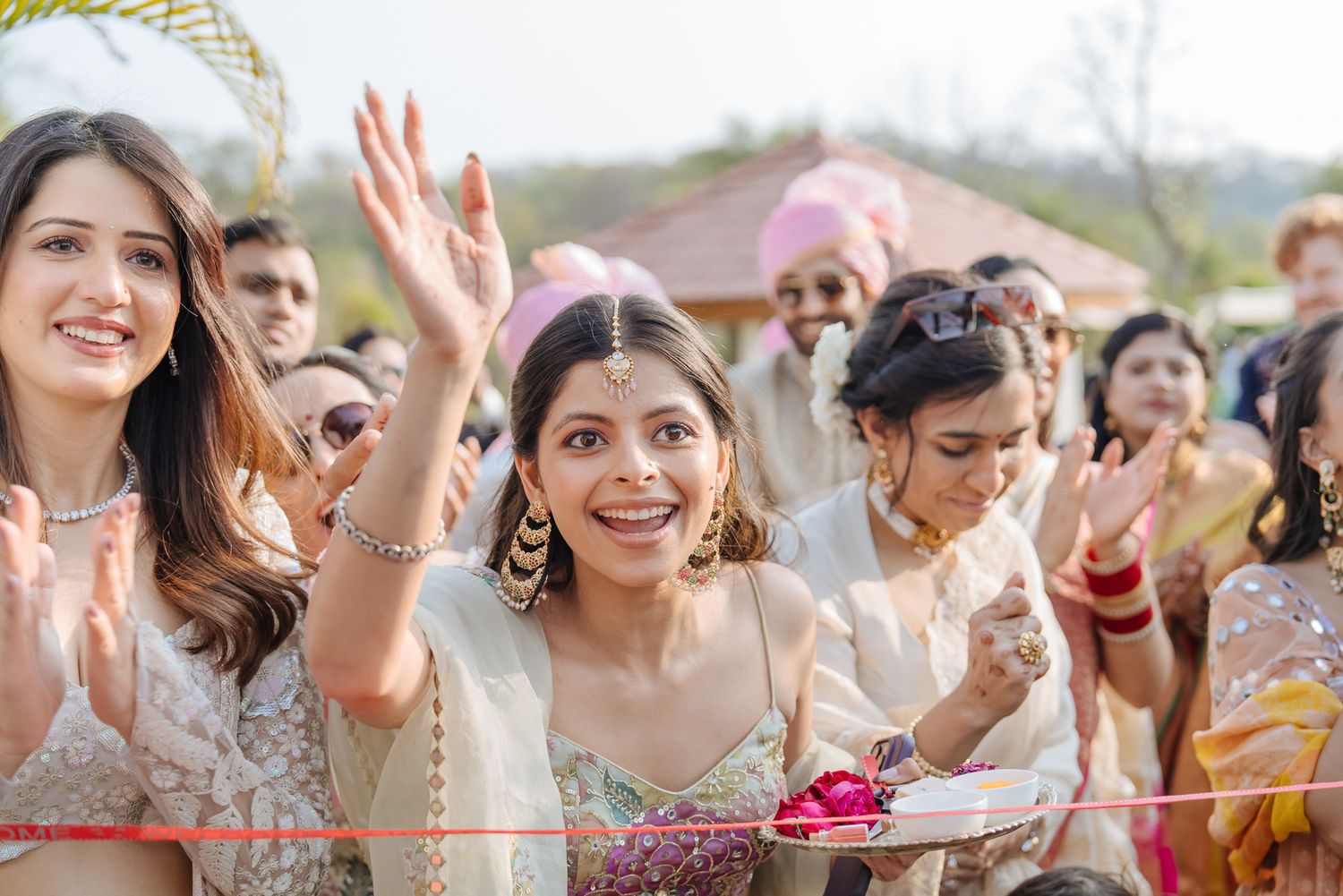 Joyful baraat with the groom's Norwegian family celebrating in Indian attire for an Indo-Norwegian fusion wedding in Forest Hill Chandigarh