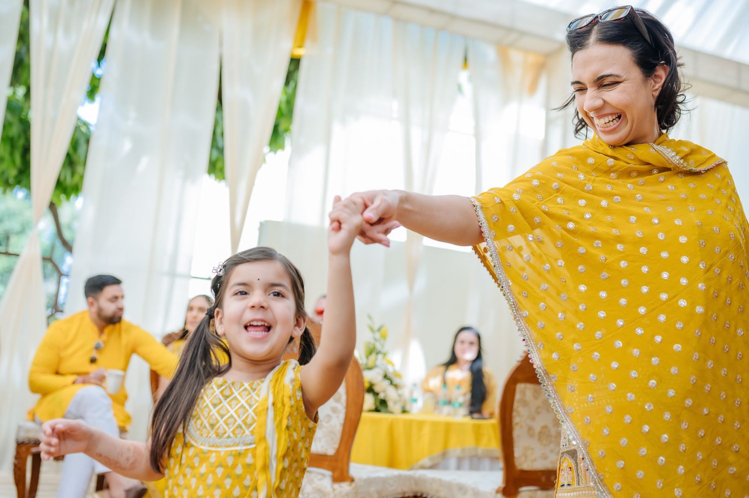 friends and family arriving for the Haldi celebration  for an Indo-Norwegian wedding of Mats and Itisha in Chandigarh
