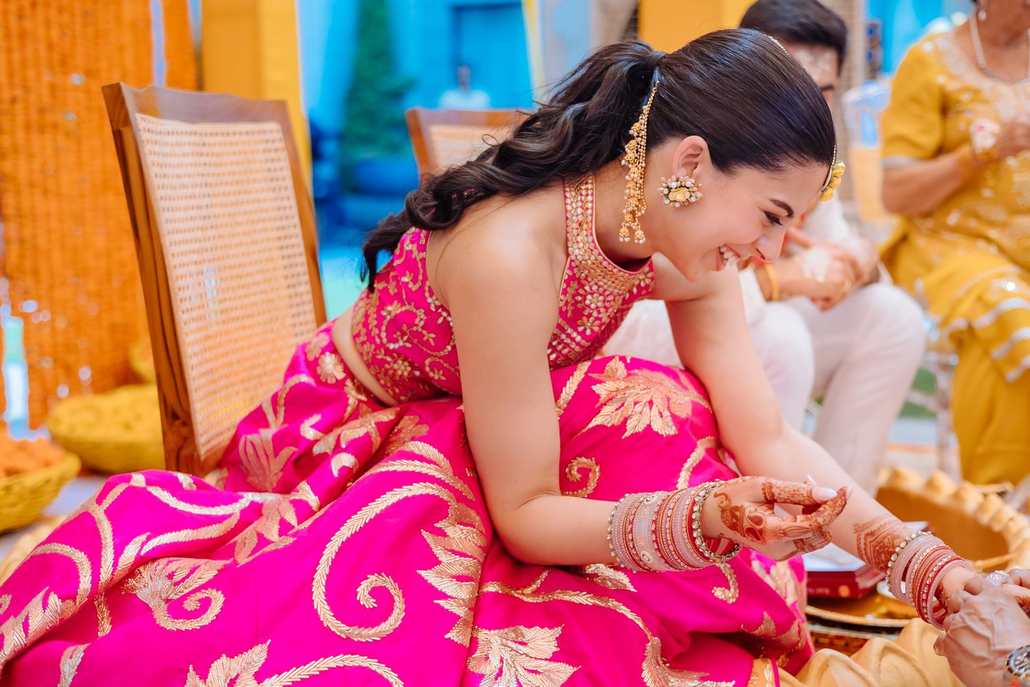 Bride-to-be Leah receiving her traditional bridal chooda during the ceremony at Tivoli Chattarpur