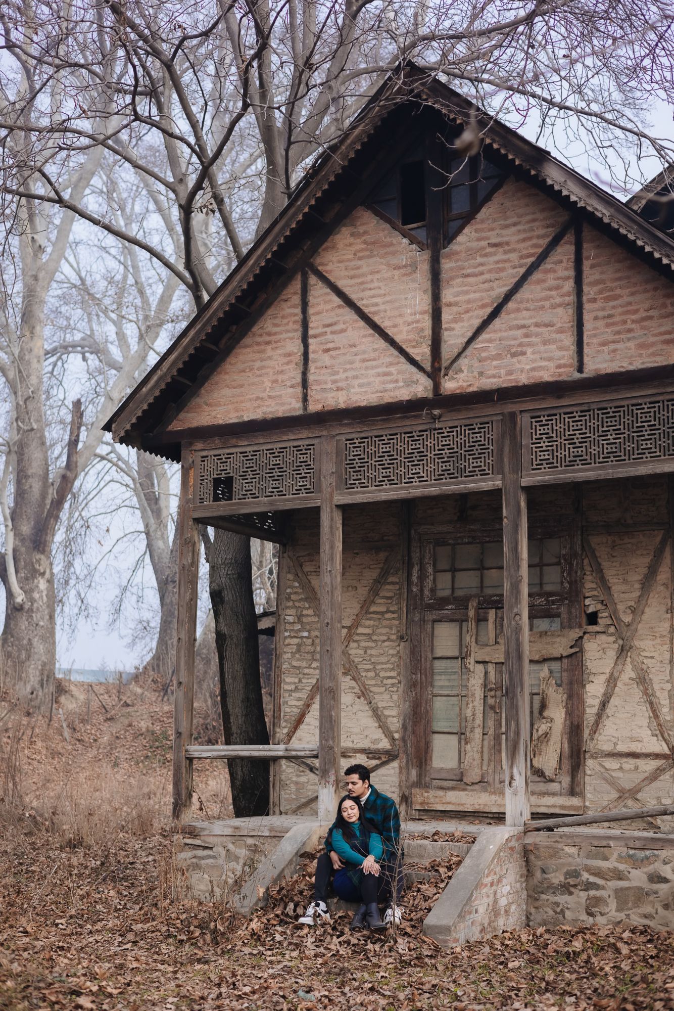 Intimate pre-wedding couple portrait with nostalgic fine-art style at a hidden secret spot in Srinagar