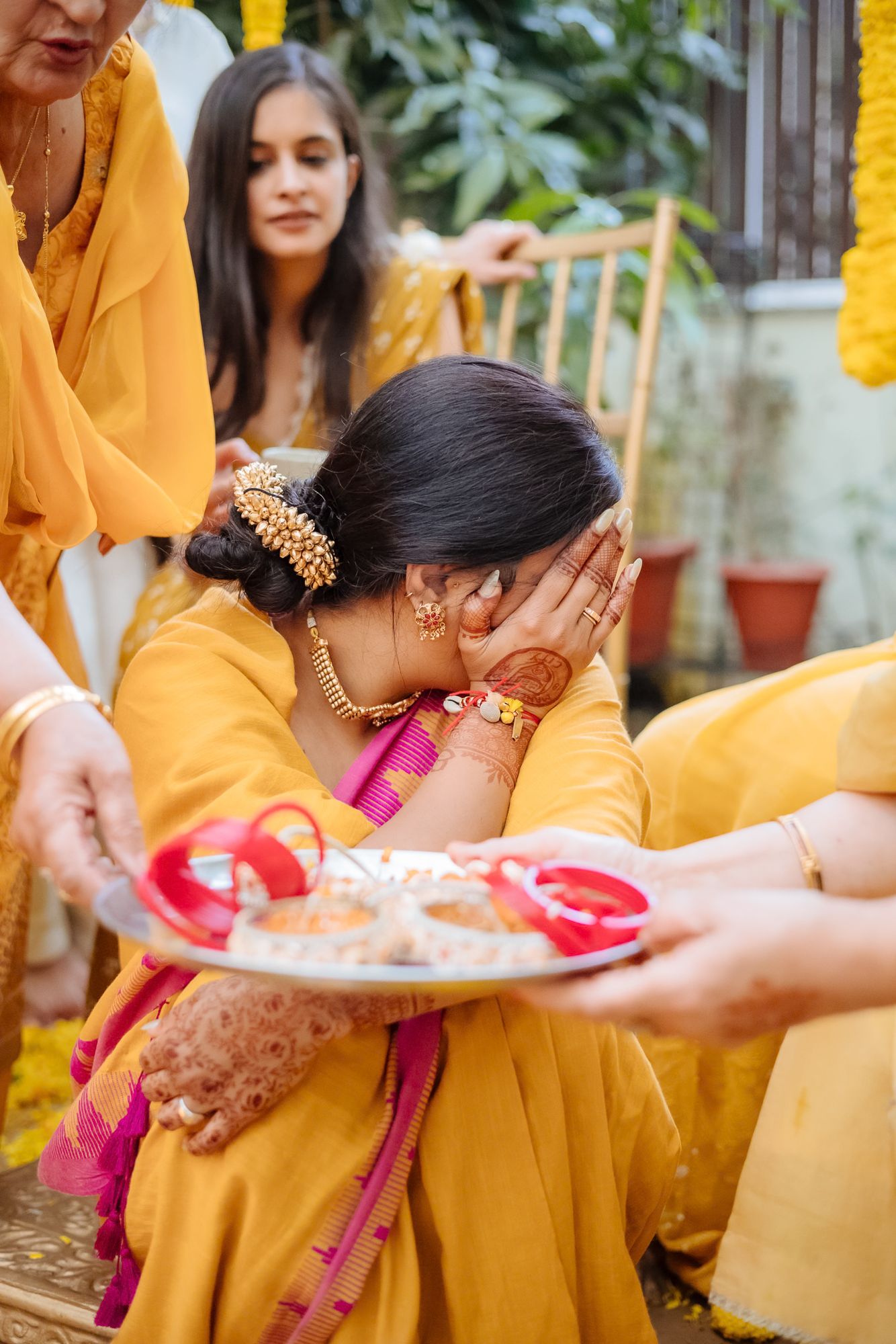 Traditional Punjabi Chooda ceremony captured in a candid storytelling style during an indo-norwegian wedding in Chandigarh
