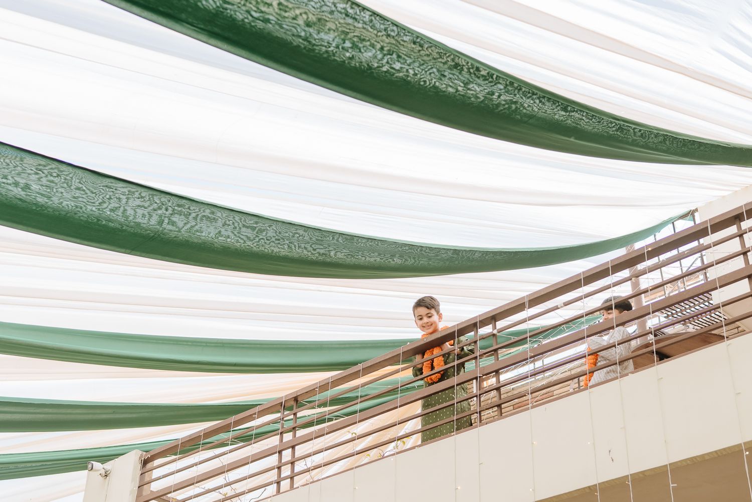 Laughter and candid moments during a luxury intimate Mehendi ceremony