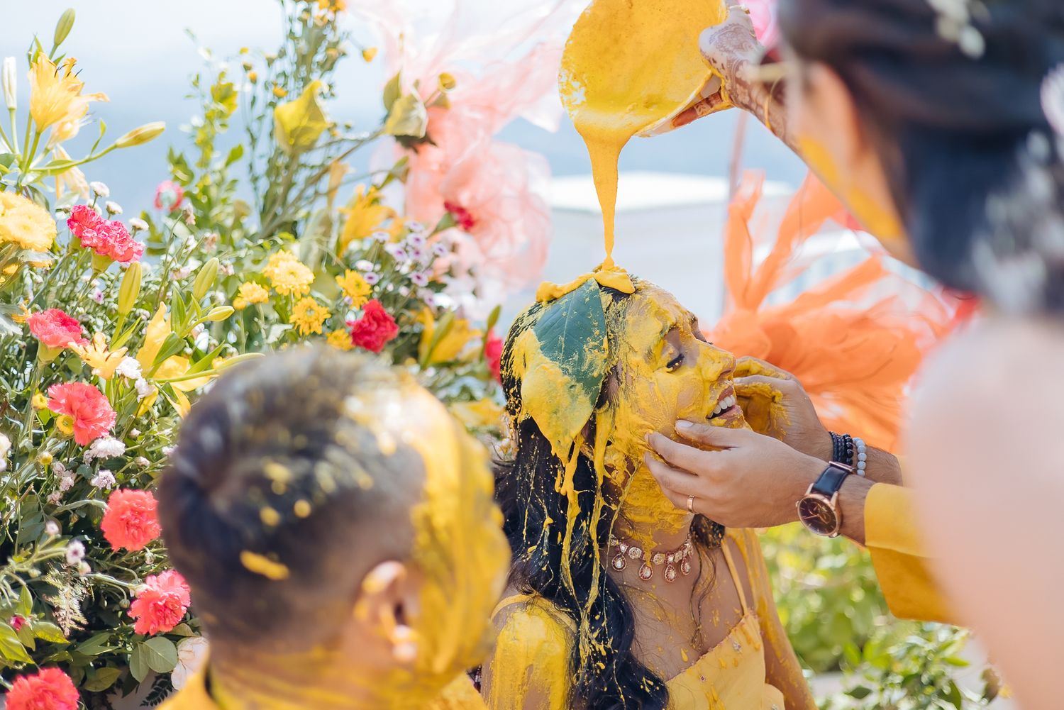 Colorful and candid Haldi moments captured by Fine-art and candid Indian wedding photography and films team Beginnings For You.
