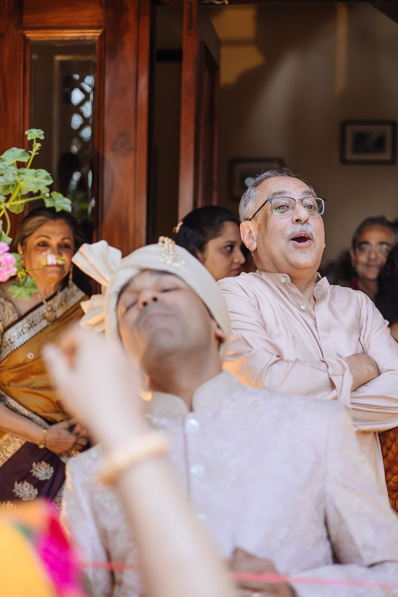 Indian groom welcome ceremony after an Indian baraat of an intimate wedding of 30 people in the hills at Daleside Manor, Kasauli