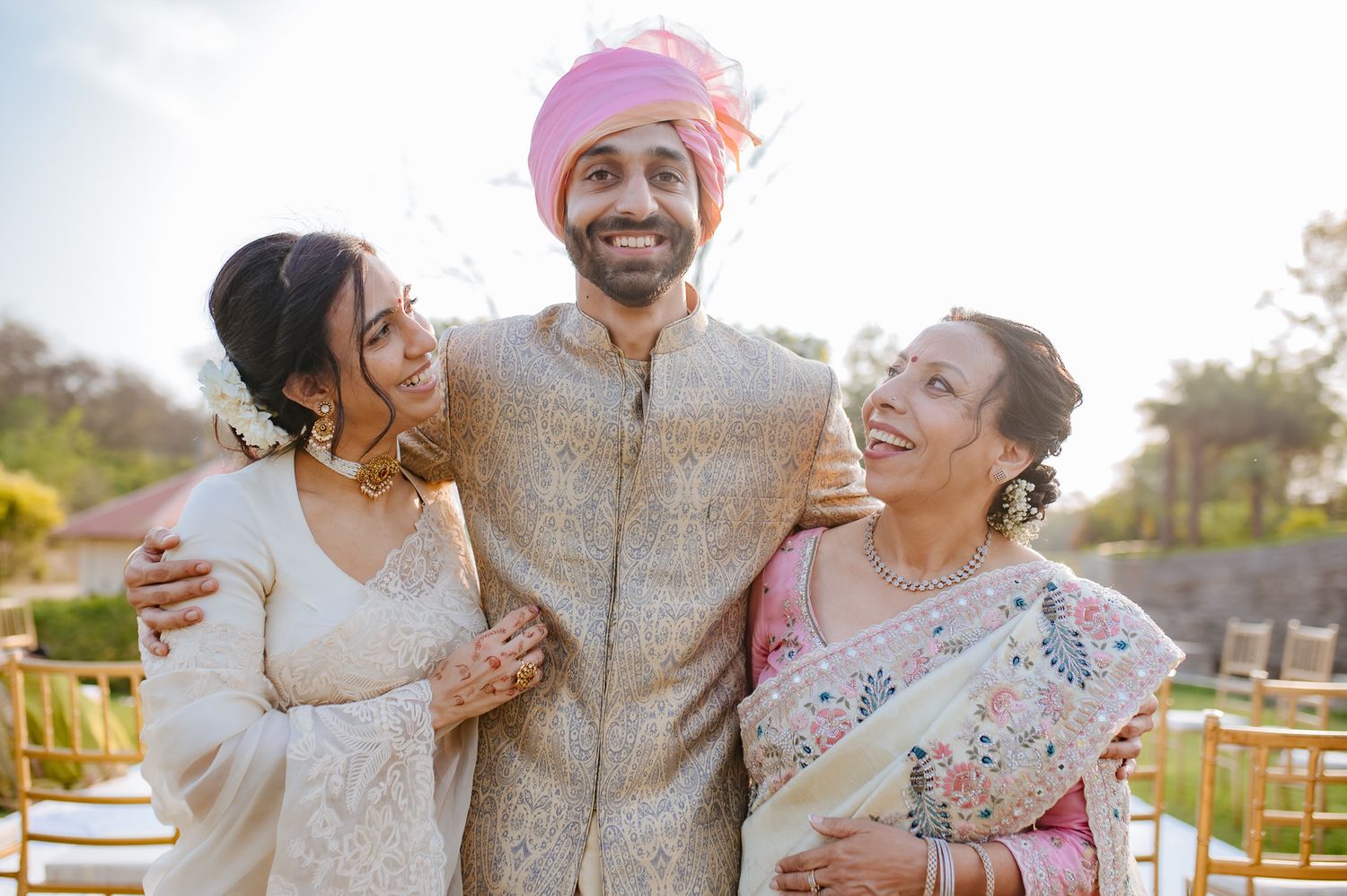 Family celebrating the groom's arrival with music and dancing