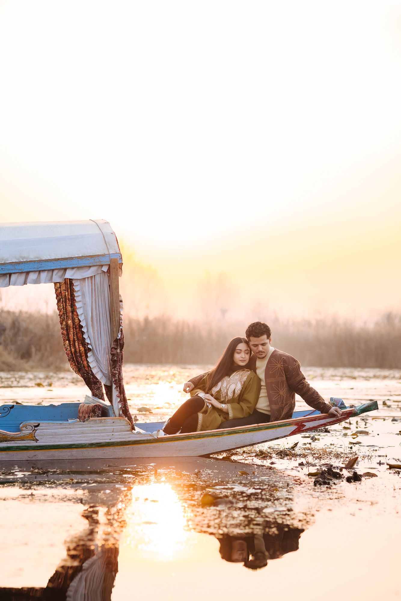 Romantic fine-art and heartfelt pre-wedding portraits in the scenic valleys of Srinagar's Dal Lake.