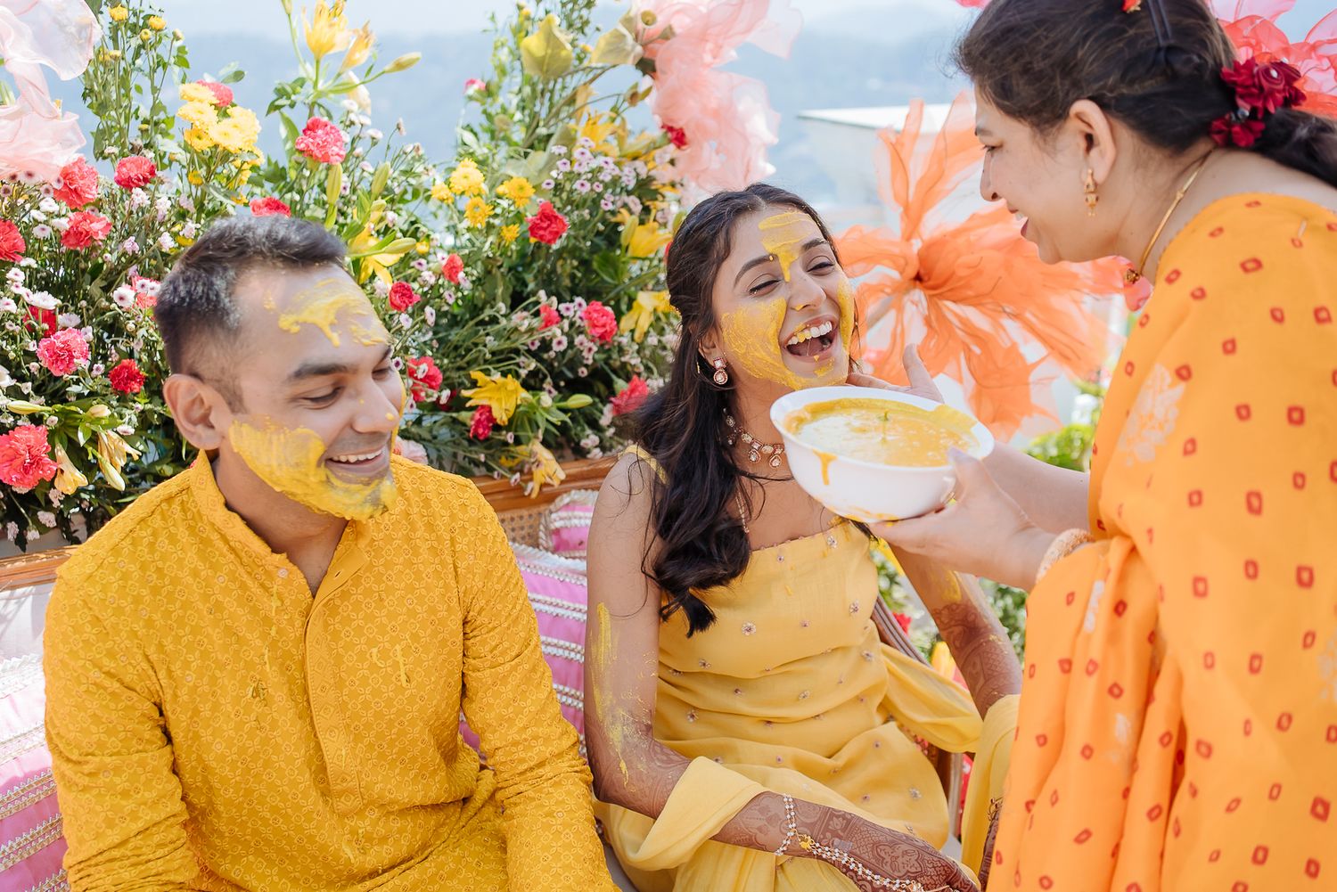 Colorful and candid haldi ceremony picturwith family and friends in Kasauli. Fine-art and candid wedding storytelling by Beginnings For You.
