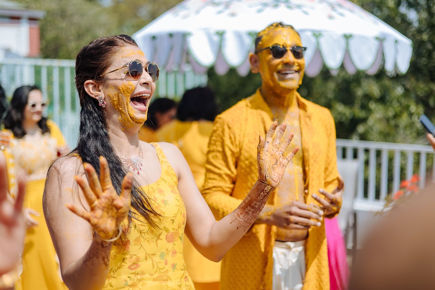 Colorful and candid Haldi moments captured by Fine-art and candid Indian wedding photography and films team Beginnings For You.